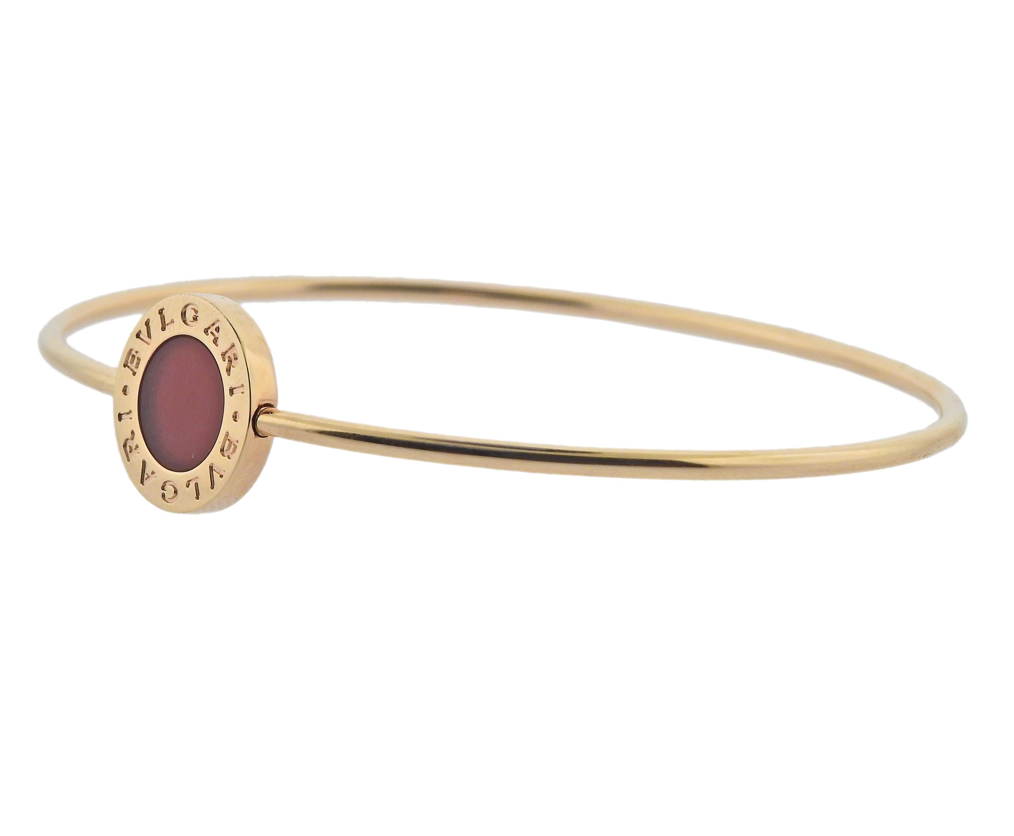 18k rose gold Bvlgari bracelet with carnelian circle.  Retail $2150. Comes with COA and box.  Bracelet will fit approx. 7