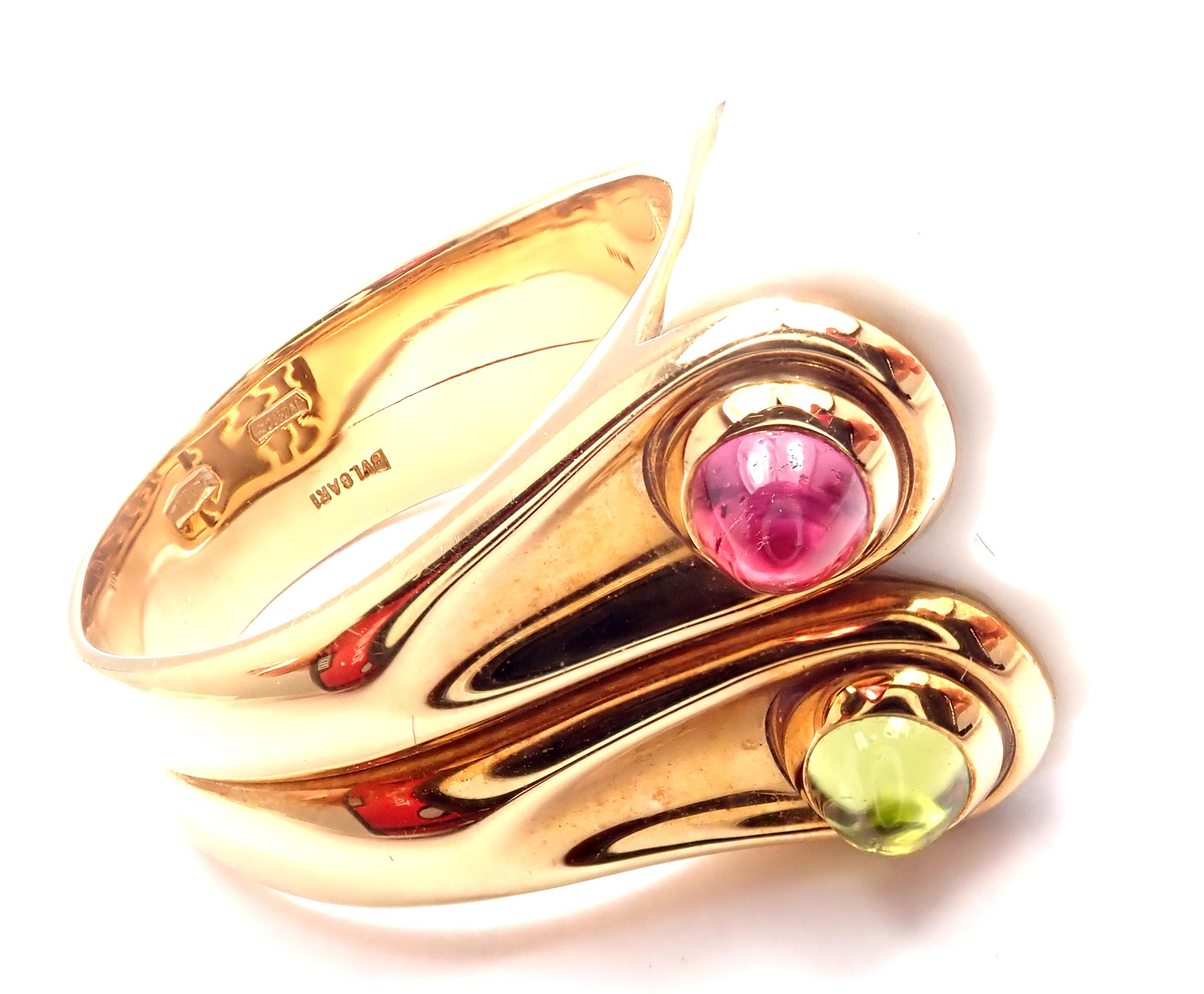 18k Yellow Gold Carved White Ceramic Pink & Green Tourmaline Ring By Bulgari. 
With 2 carved ceramic stones
2 pink & 2 green tourmalines
Details:
Size: 6.5
Weight: 14.8 grams
Width: 16mm
Stamped Hallmarks: Bvlgari 750
*Free Shipping within the