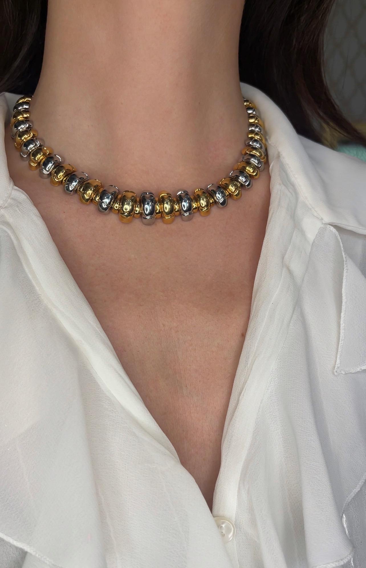 An elegant and timeless Bulgari 'Celtaura' Steel and 18k Yellow Gold Necklace. Made in Italy, circa 1990. 