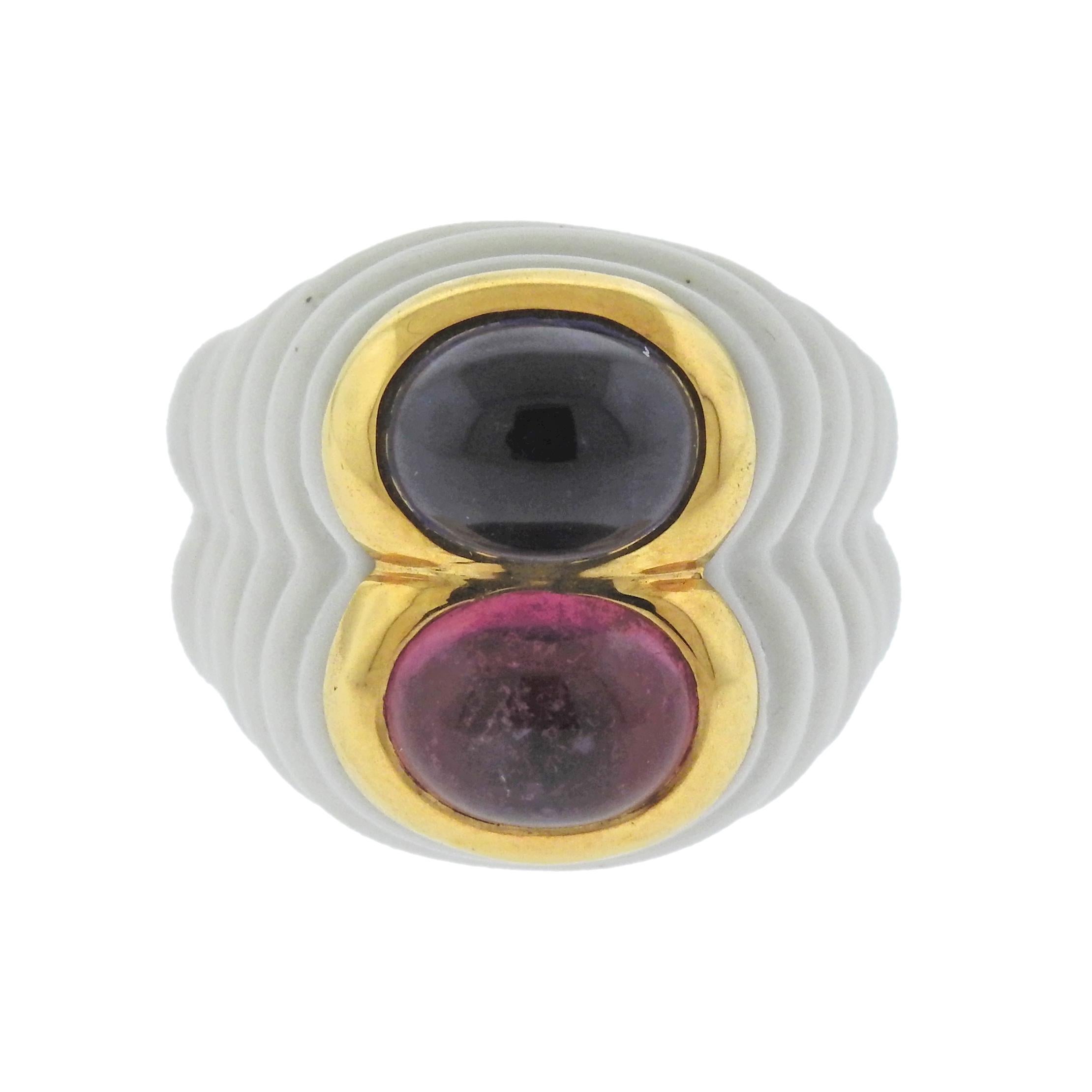 18k gold and white ceramic Bulgari ring, set with iolite and pink tourmaline cabochons. Ring size - 5 3/4, ring top is 18mm wide, weighs 10.8 grams. Marked: Bvlgari, 750, Italian mark.