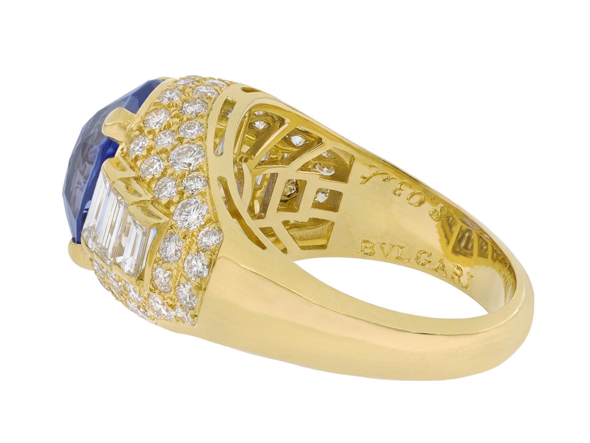 Bulgari Ceylon sapphire and diamond 'Trombino' ring. Set to centre with one oval mixed cut natural unenhanced Ceylon sapphire in an open back claw setting with an approximate weight of 8.03 carats, flanked to either side with six rectangular step