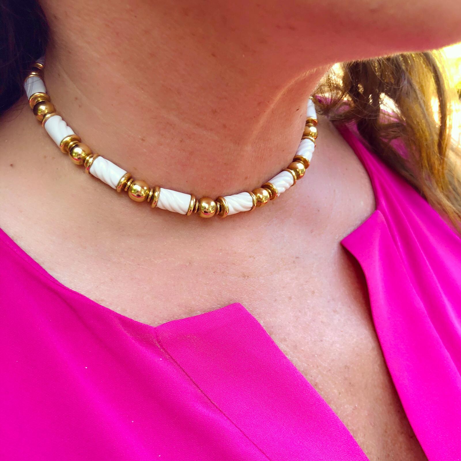 Bulgari 18Kt Yellow Gold & Porcelain Beaded Necklace from the Chandra Collection. The necklace measures 16 inches long and 8mm wide, weighing 77.4 grams.