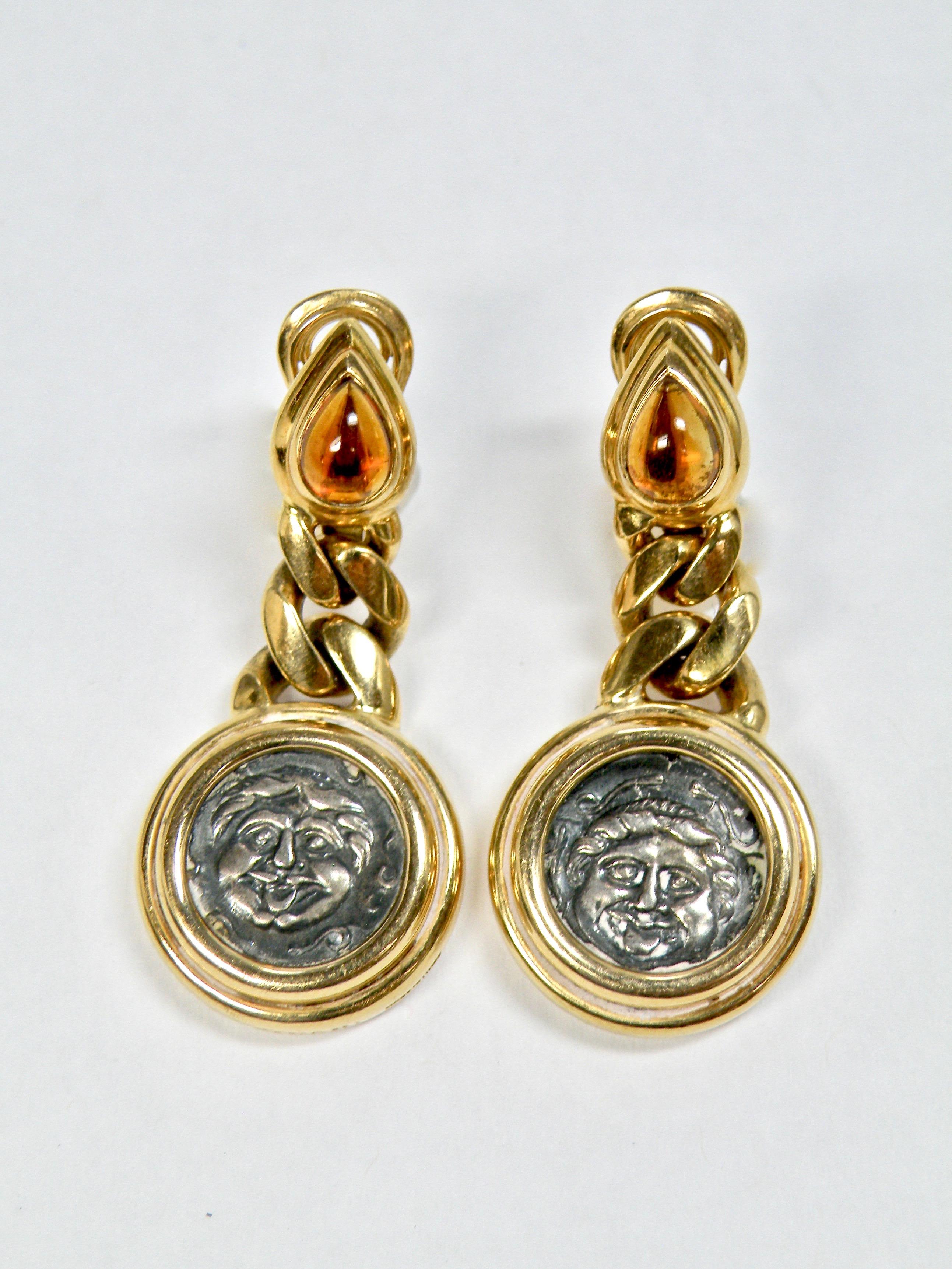 18 karat Bulgari Monete Gold ancient coin earrings with stylish citrine clips and chain links. From the 4 th century B.C. Marked Bulgari 750
Made in Italy,Mysia Persia
Measures approximately 1 and 1/2 