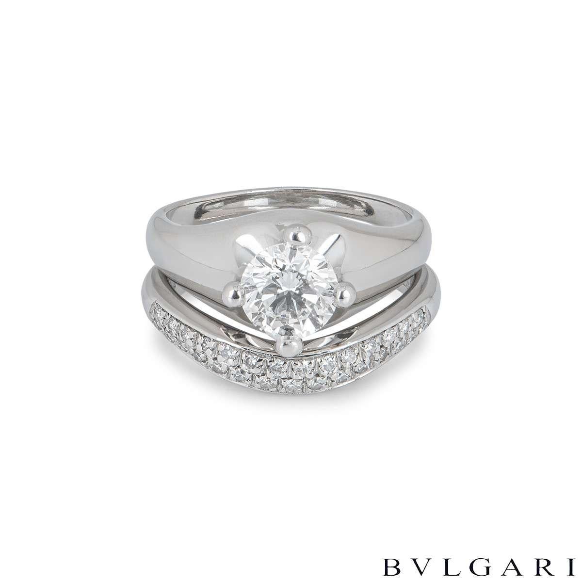 A stunning platinum Bulgari diamond engagement ring and wedding band set from the Corona collection. The engagement ring is set to the centre with a 1.00ct round brilliant cut diamond in a raised four claw compass setting, G colour and VVS2 clarity.