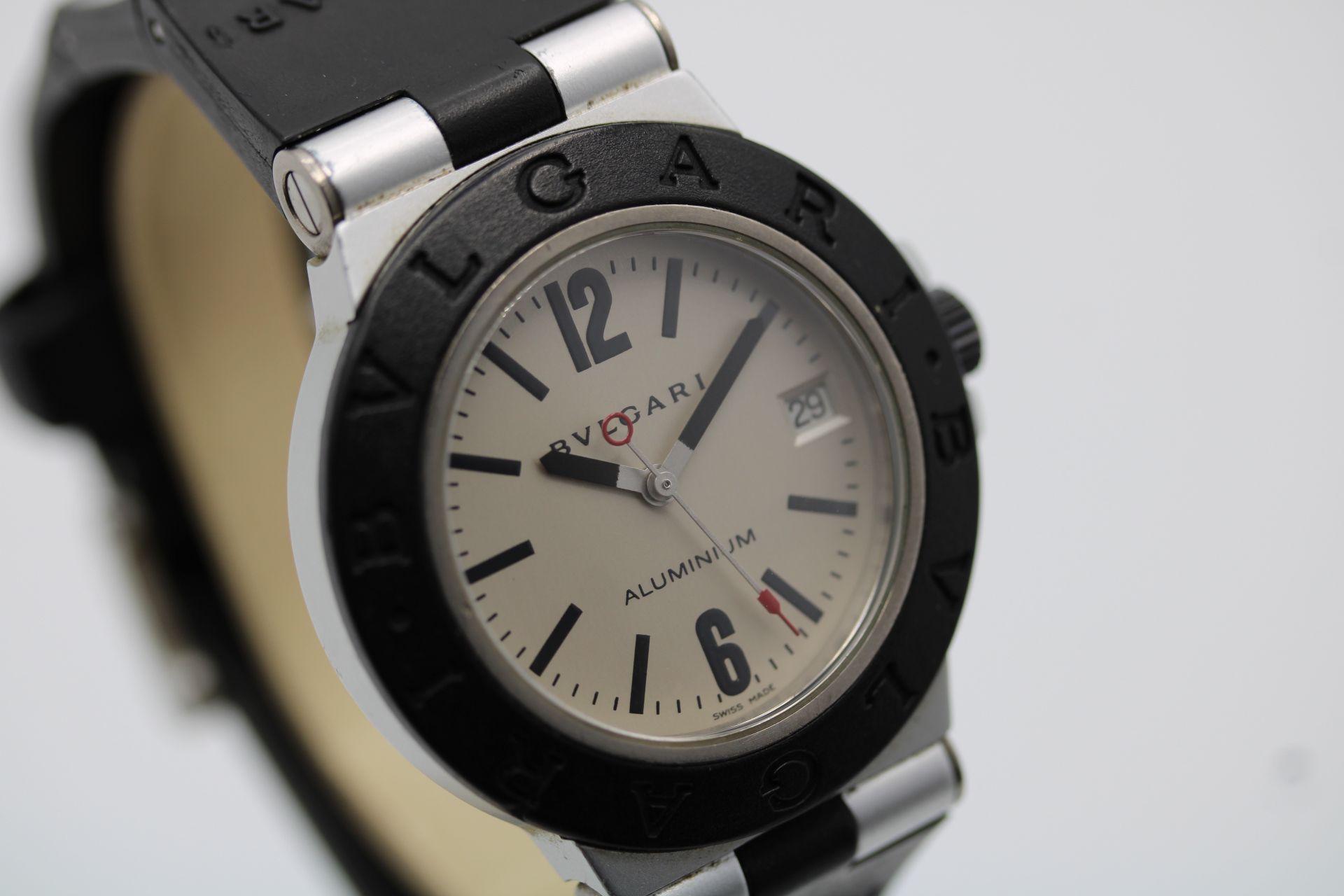 This Bulgari Diagono is accompanied with its original box, manuals and papers dated August 2001 in addition to our 12-month warranty.

The Bulgari Diagono, model AL38TA, features a 38mm aluminum case, fixed bezel with the brand name engraved around