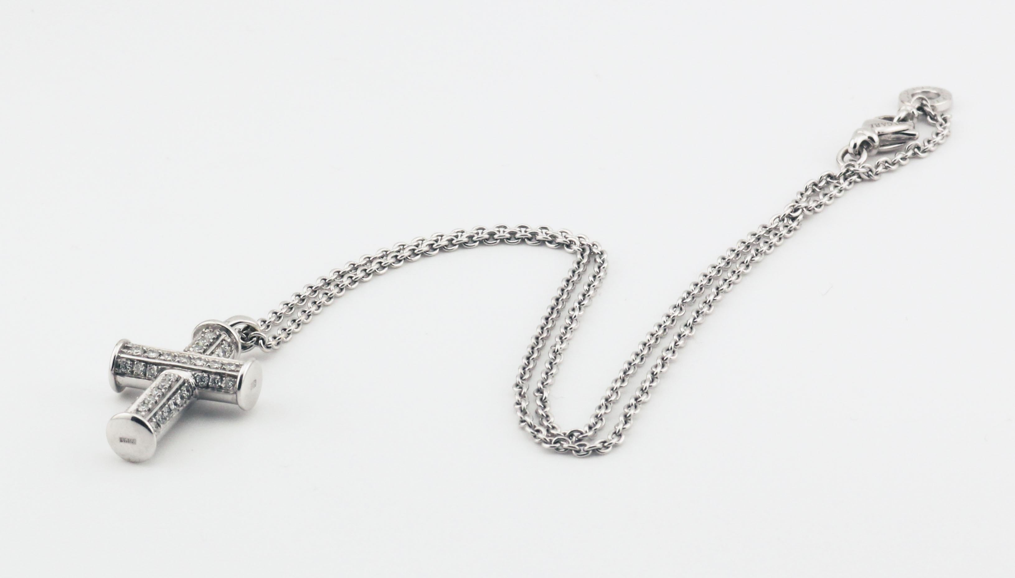 The Bulgari Diamond 18K White Gold Cross Necklace is a stunning testament to Bulgari's iconic craftsmanship and timeless elegance. The cross pendant is meticulously crafted in lustrous 18K white gold, exuding sophistication and refinement. Designed