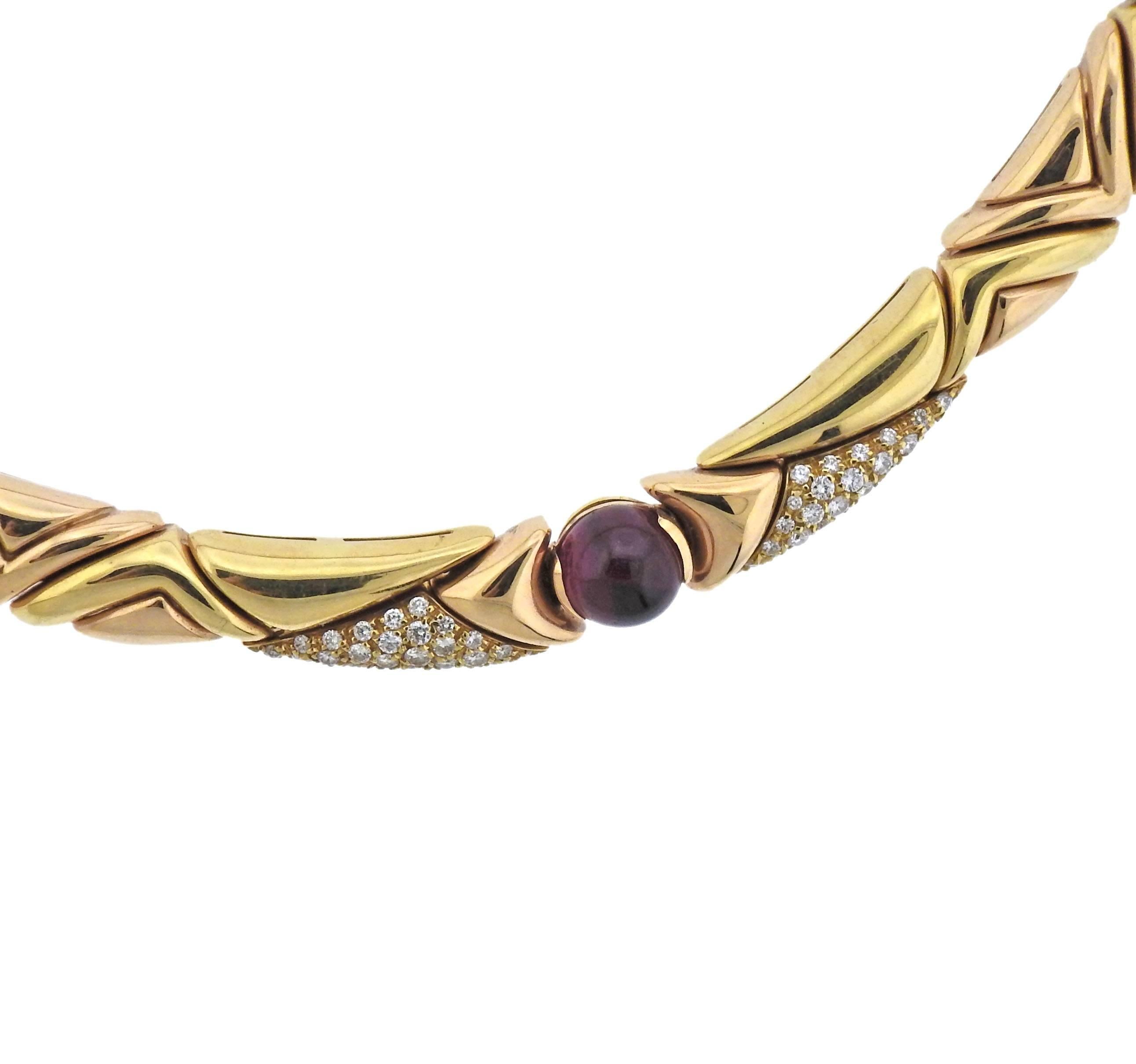  18k yellow gold necklace, crafted by Bulgari, decorated with 8mm tourmaline, citrine and amethyst balls, and approx. 2.50ctw in G/VS diamonds . Necklace is 15
