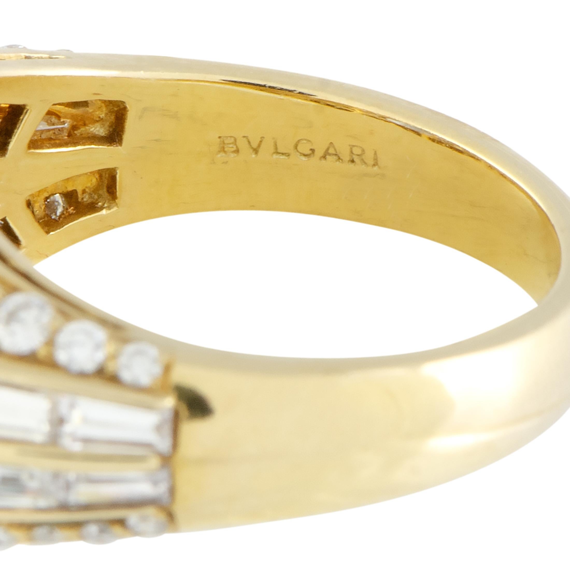 The fascinating sapphire takes the central place in this Bvlgari ring in an exceptionally imposing fashion, luxuriously complemented by the lustrous glisten of diamonds and the alluring radiance of 18K yellow gold. The sapphire weighs 2.89 carats,