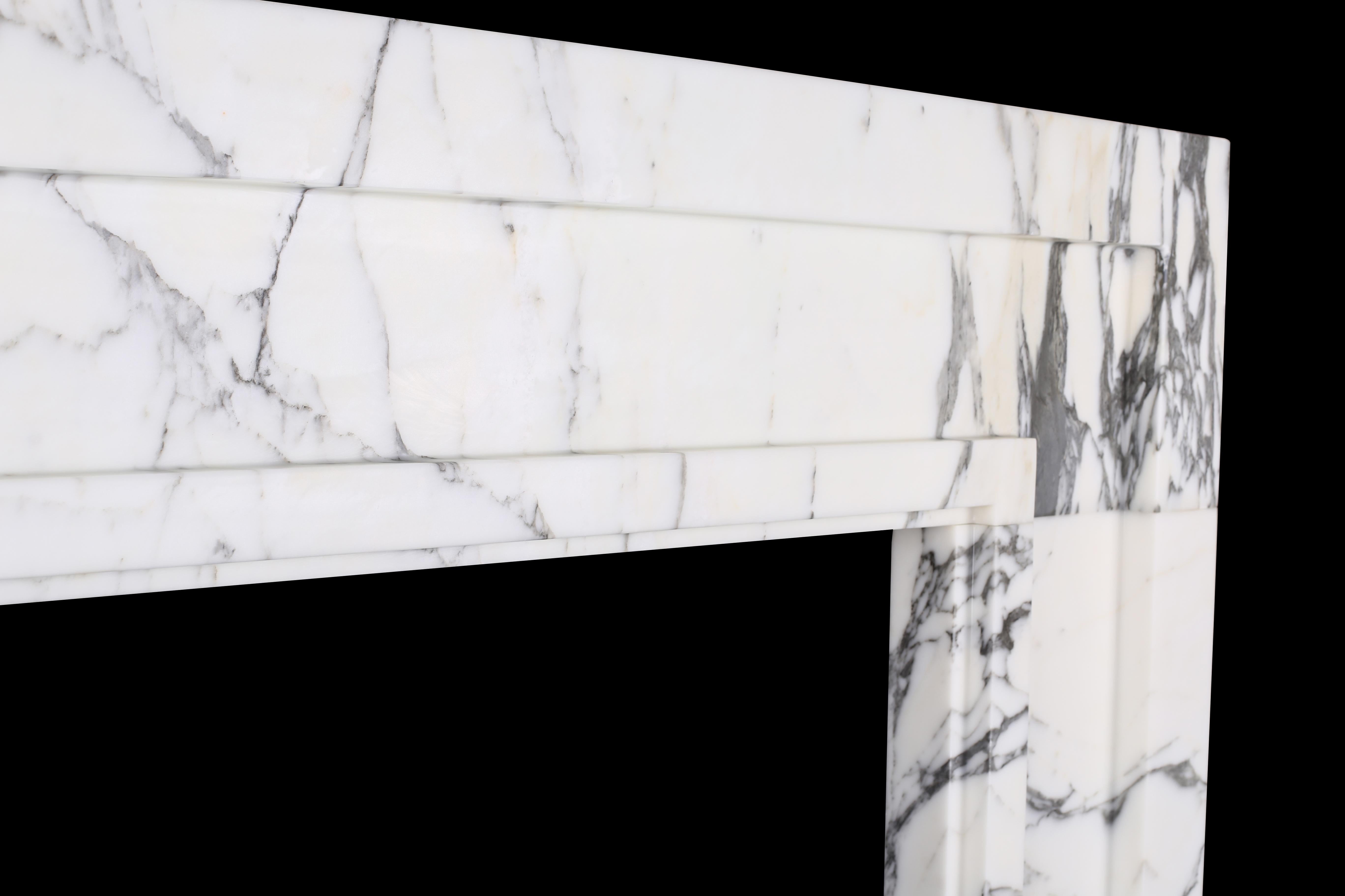 A stylish and elegant grand bolection fireplace surround in Italian Arabescato marble

Depth: 3 1/2