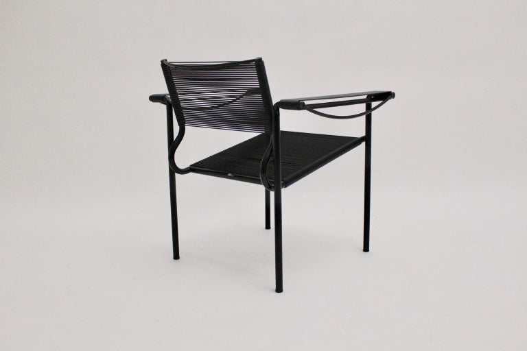 Giandomenico Belotti (1922-2004) was born in Bergamo.
This Spaghetti armchair was made of tube steel, black lacquered, and features black plastic cords and four rubber sabots.

Labeled on the backside of the seat
approx. measures:
Width 69 cm
Depth