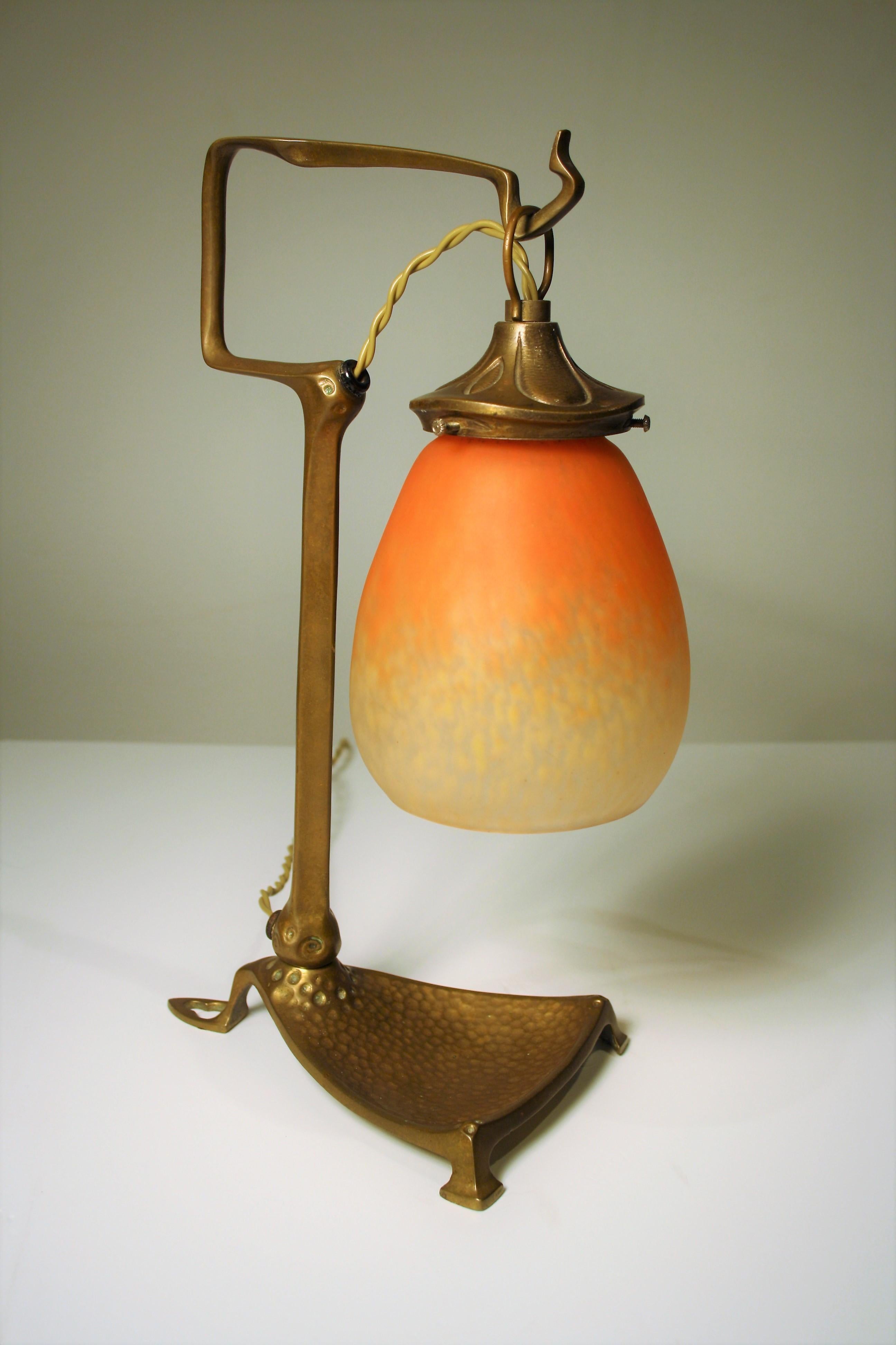 Art Nouveau bronze table lamp from Friedrich Adler, with a signed Schneider glass.
Electricity conform for the US.