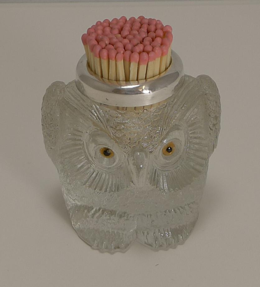 Always highly sought-after and collectable, these moulded figural Owl match strikes or table vestas don't come around all that often. The rim is made from English Sterling silver and is hallmarked for London 1907, Edwardian in era.

It is also