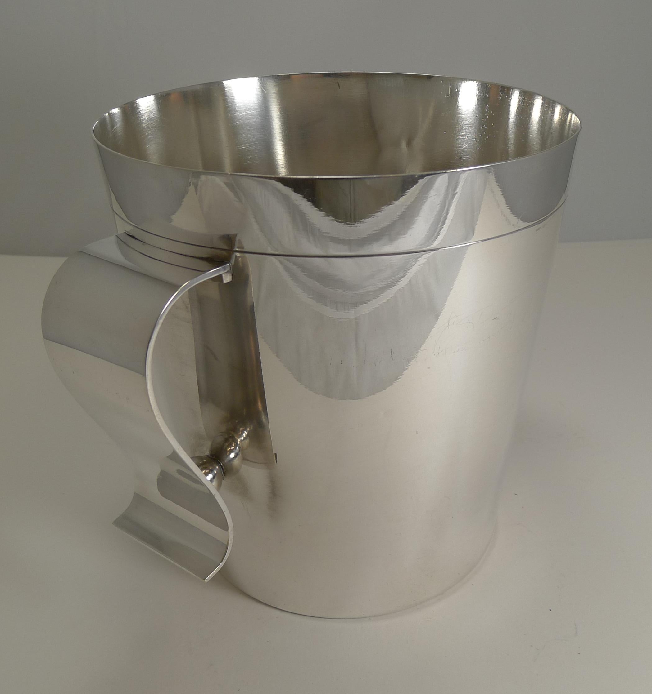 A scarce find in this design, this fabulous and stylish silver plated wine or champagne cooler is by the top-notch French silversmith, Christofle.

This design is by one of the most sought-after designers of the Art Deco era, Luc Lanel.

Dating