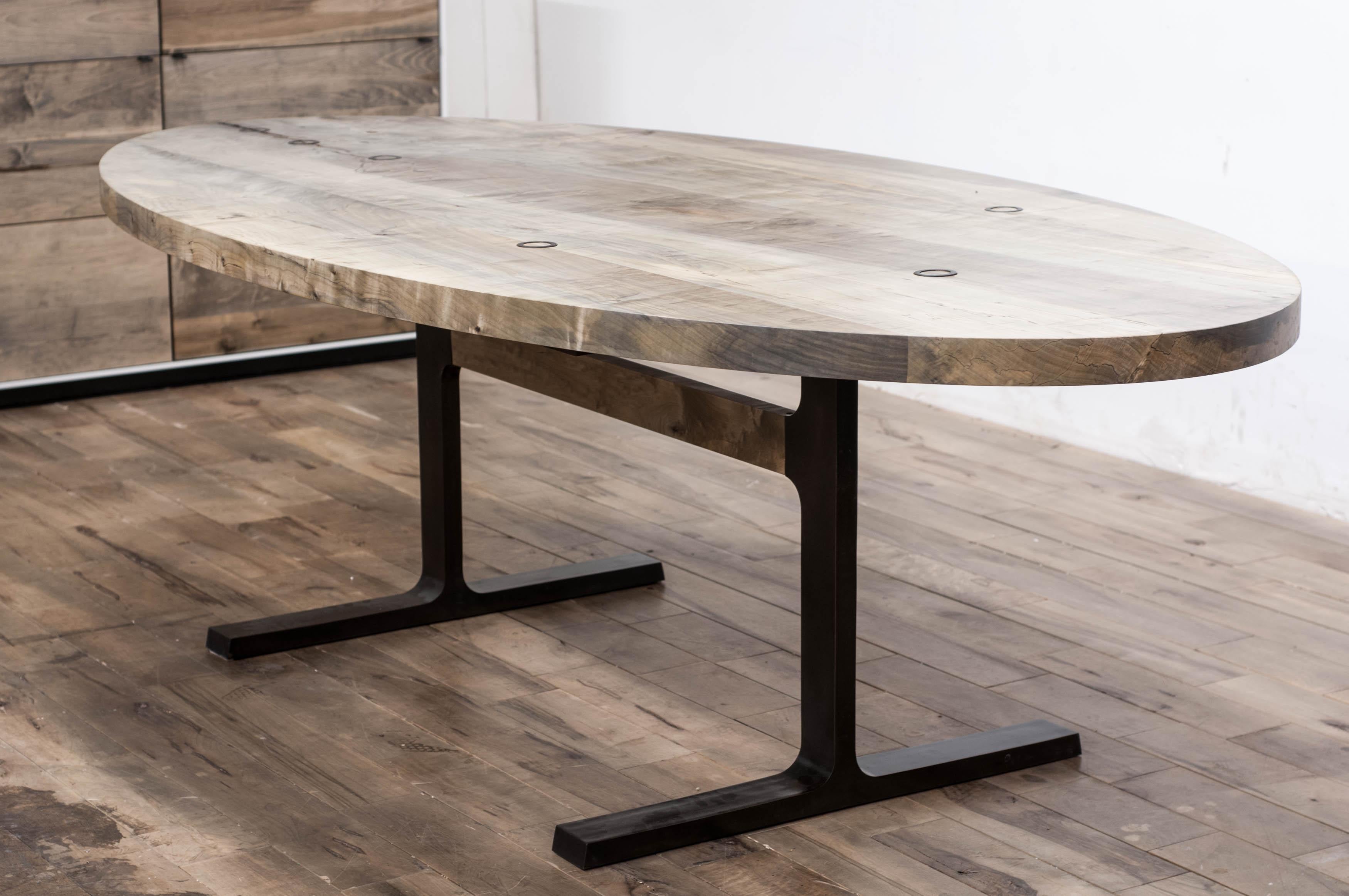 The Shaker table is the first award winning design from the studio at Jeff Martin Joinery. It examines the interface between cast bronze and solid wood using bronze casting for joinery functionality. 

Distilled to its purest elements, the bronze
