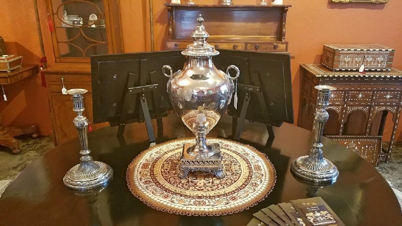 Presenting a gorgeous mid-19th century ‘Old Sheffield Plated Silver’ samovar with mother of pearl handle by the very highly regarded Elkington & Co, and dating from 1852.

It is fully marked on the base. The first mark signifies ‘electro plate’,
