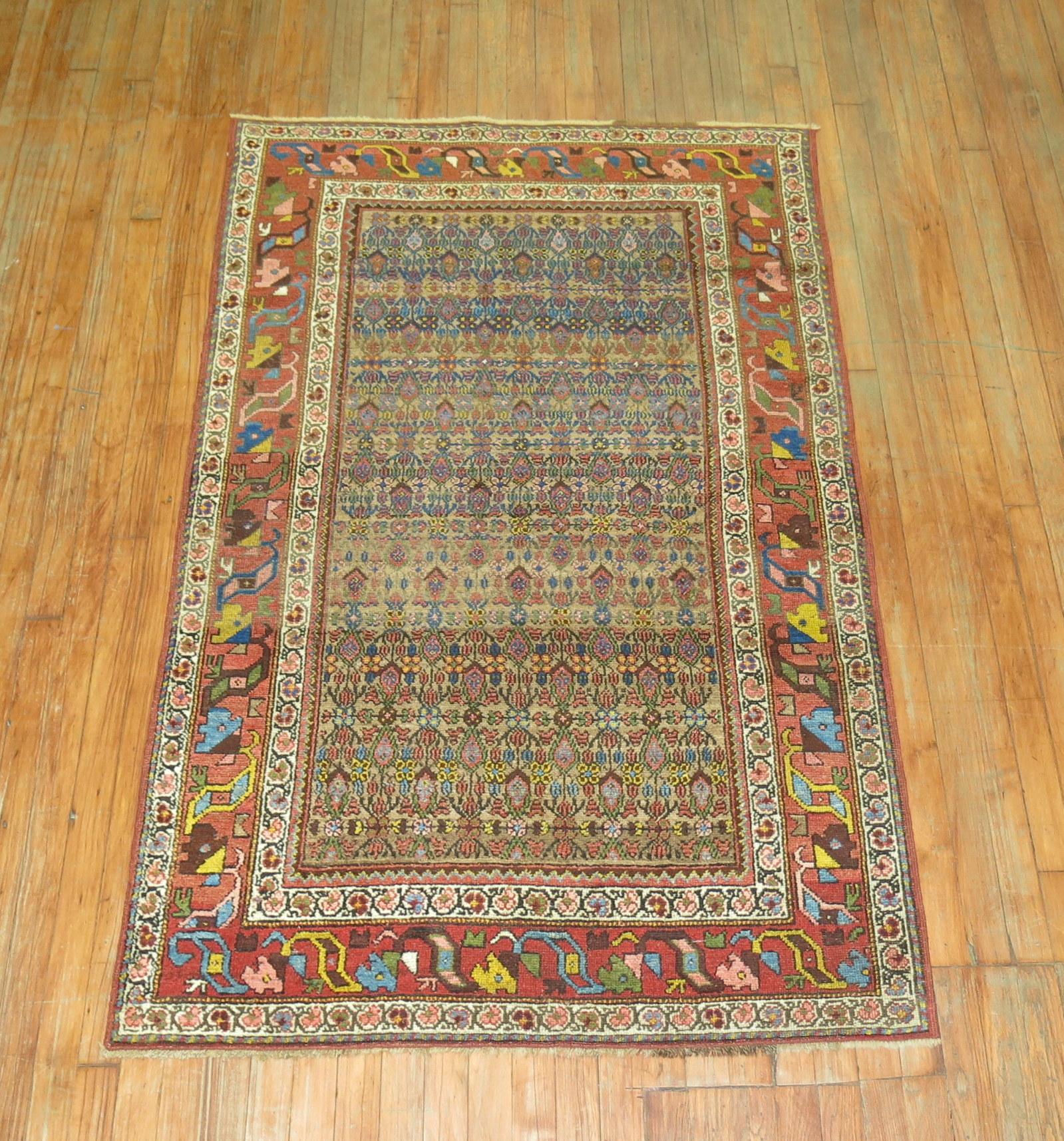 A colorful early 20th century Persian Kurd Serab rug.