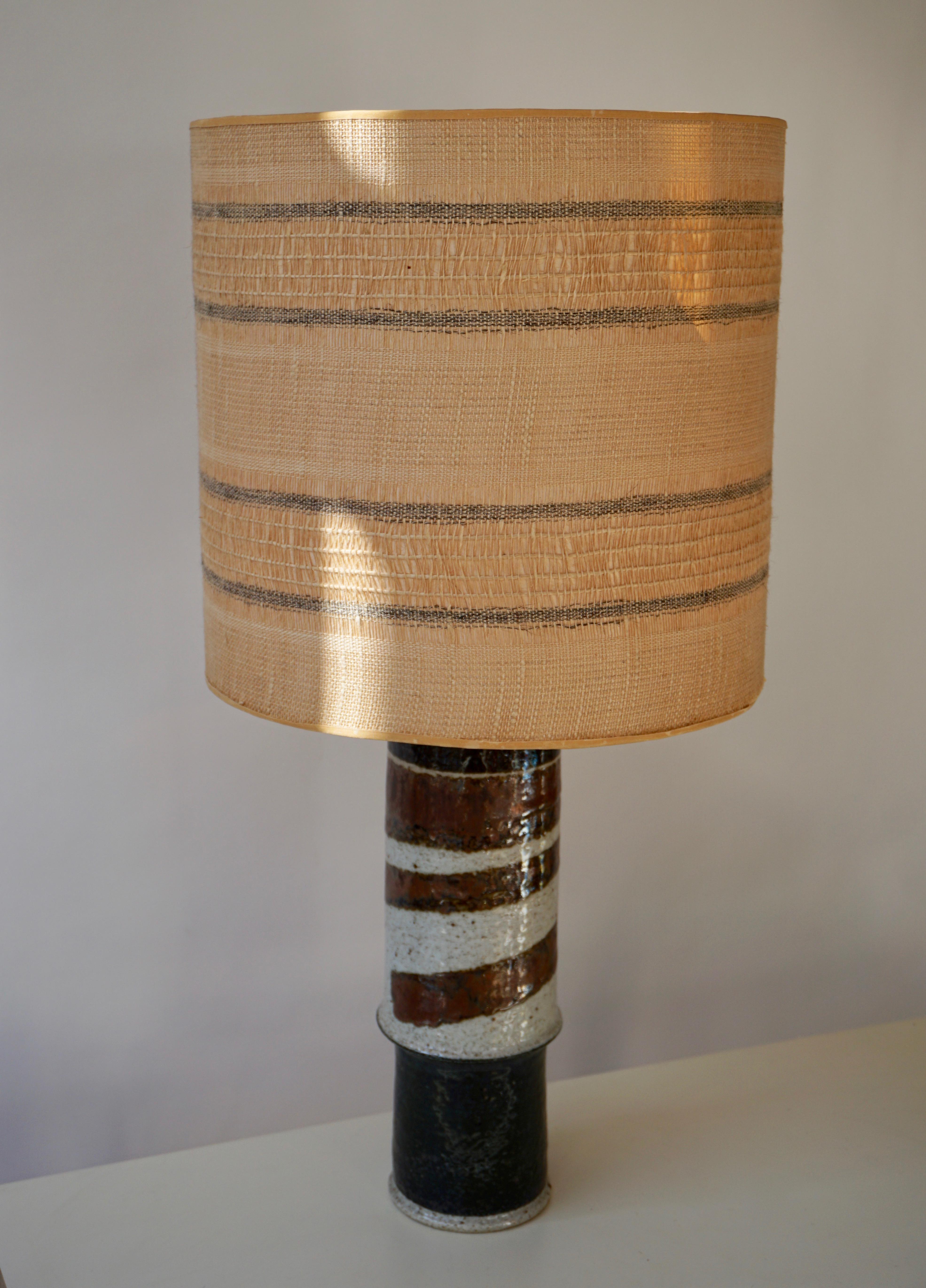 Inger Persson table lamp. Rörstrand. Signed IP Ateljé, Sweden.
Measure: H include shade 71 cm.
Diameter shade 35 cm.
Diameter 12 cm.
Height base 42 cm.