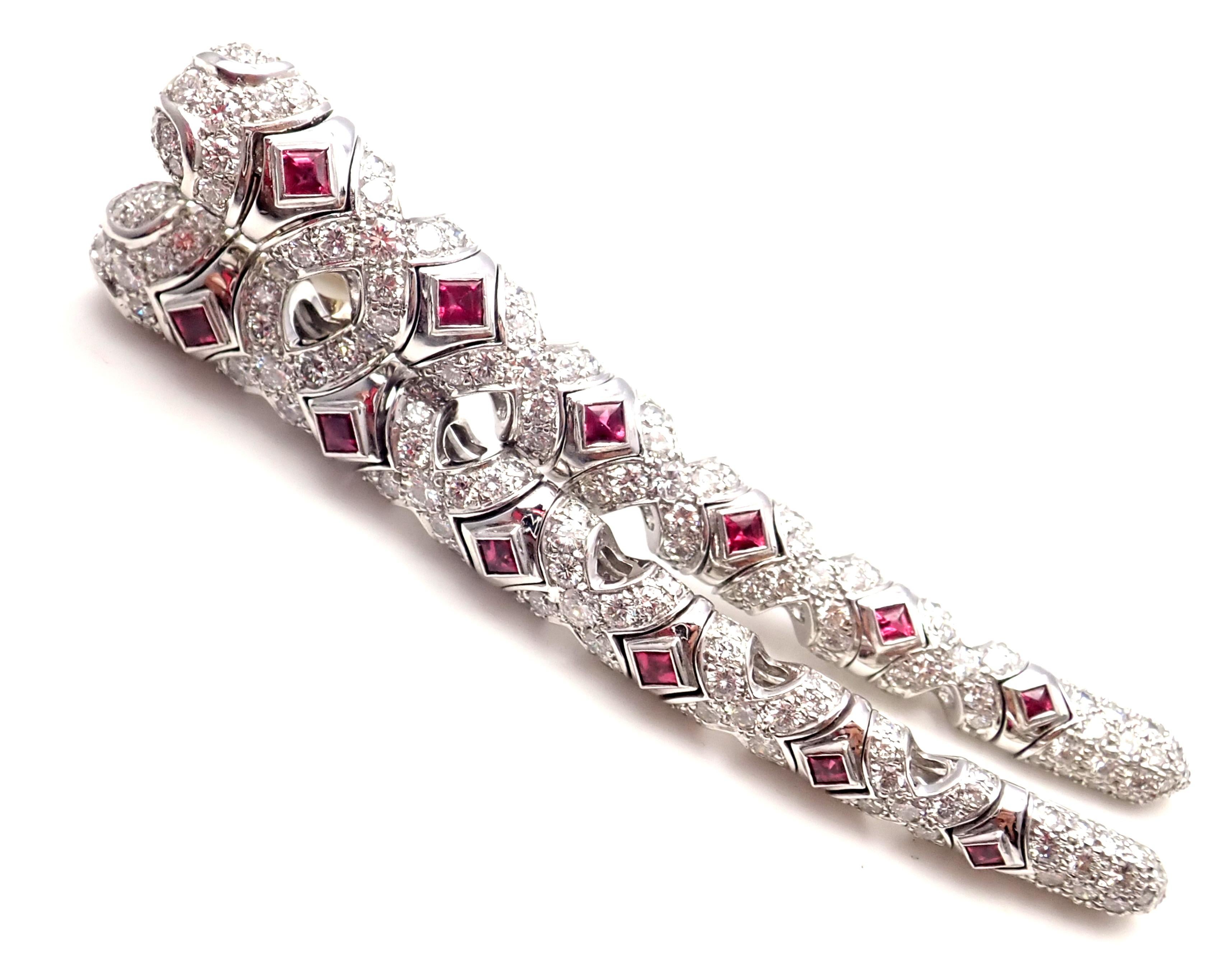 18k White Gold Diamond And Ruby Long Drop Earrings by Bulgari. 
These earrings comes with an original Bulgari box. 
With 218 round brilliant cut diamonds VVS1 clarity E color total weight approx. 5.45ct
12 Rubies total weight approx.