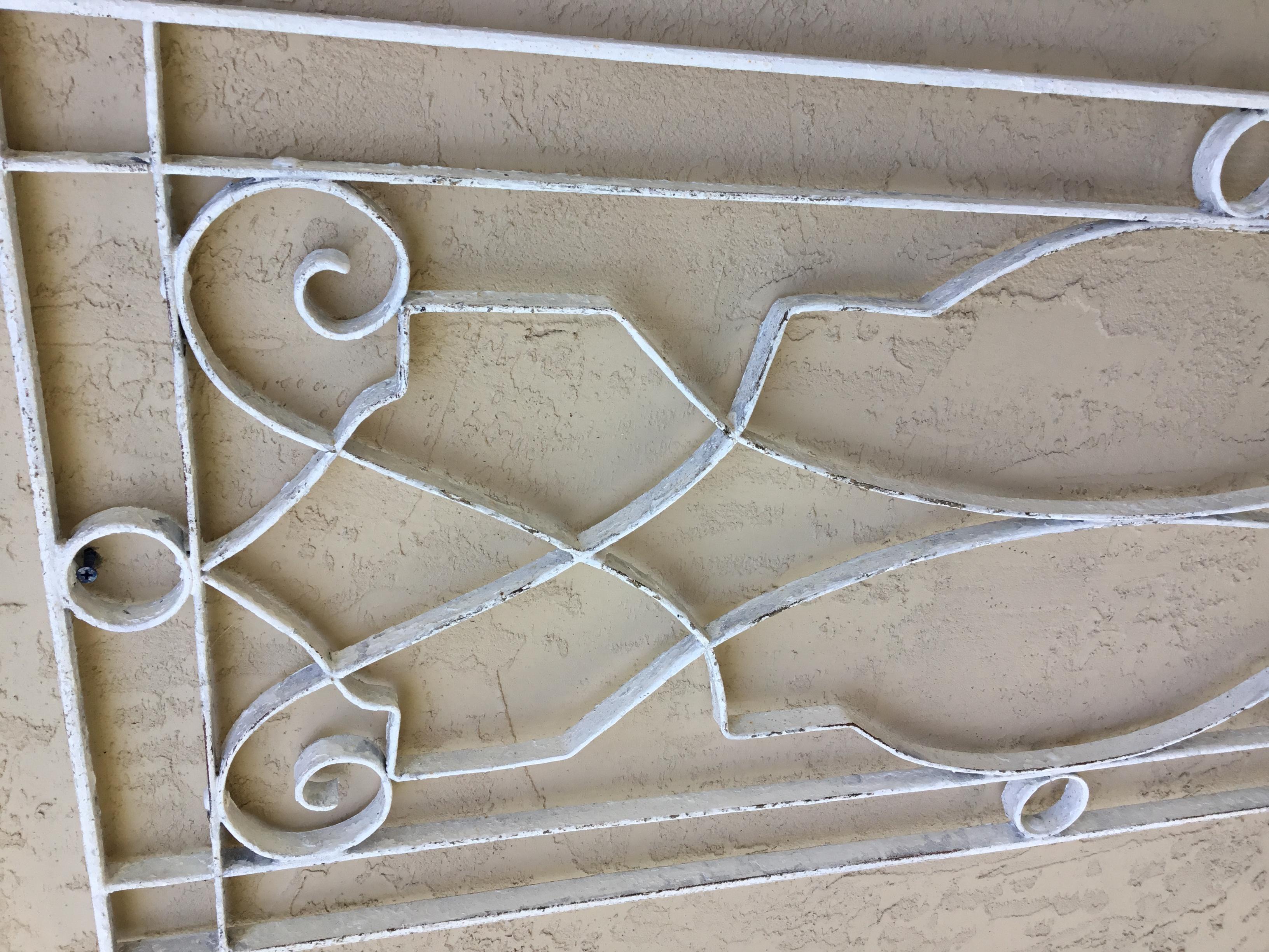 Pair of Large Architectural Iron Wall Hanging In Good Condition For Sale In Delray Beach, FL