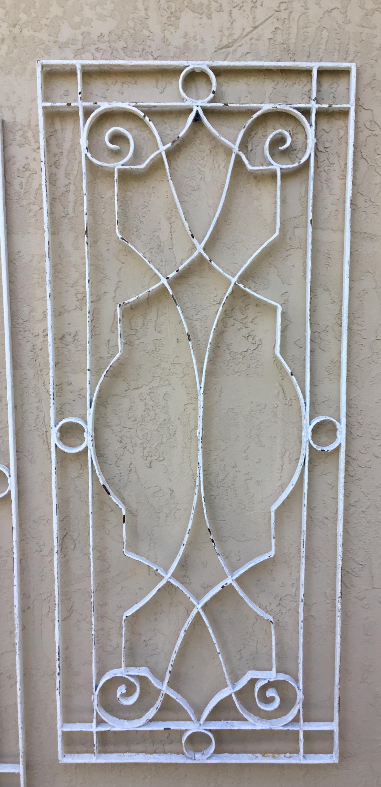 Wrought Iron Pair of Large Architectural Iron Wall Hanging For Sale