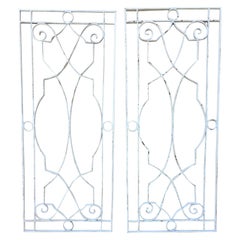 Pair of Large Architectural Iron Wall Hanging