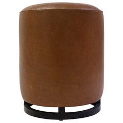 Round Leather Pouf on Dark Mahogany Base with Circular Detail at Seat