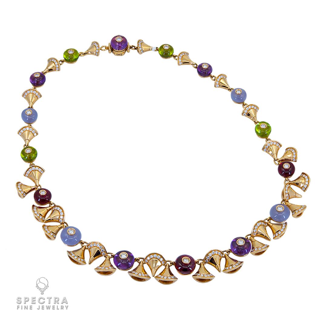 A stunning creation by Bvlgari, this striking necklace is crafted in 18k rose gold and showcases the brand’s signature cone-shaped motifs. Each element is beautifully adorned with brilliant-cut diamonds and polished gemstone beads, including