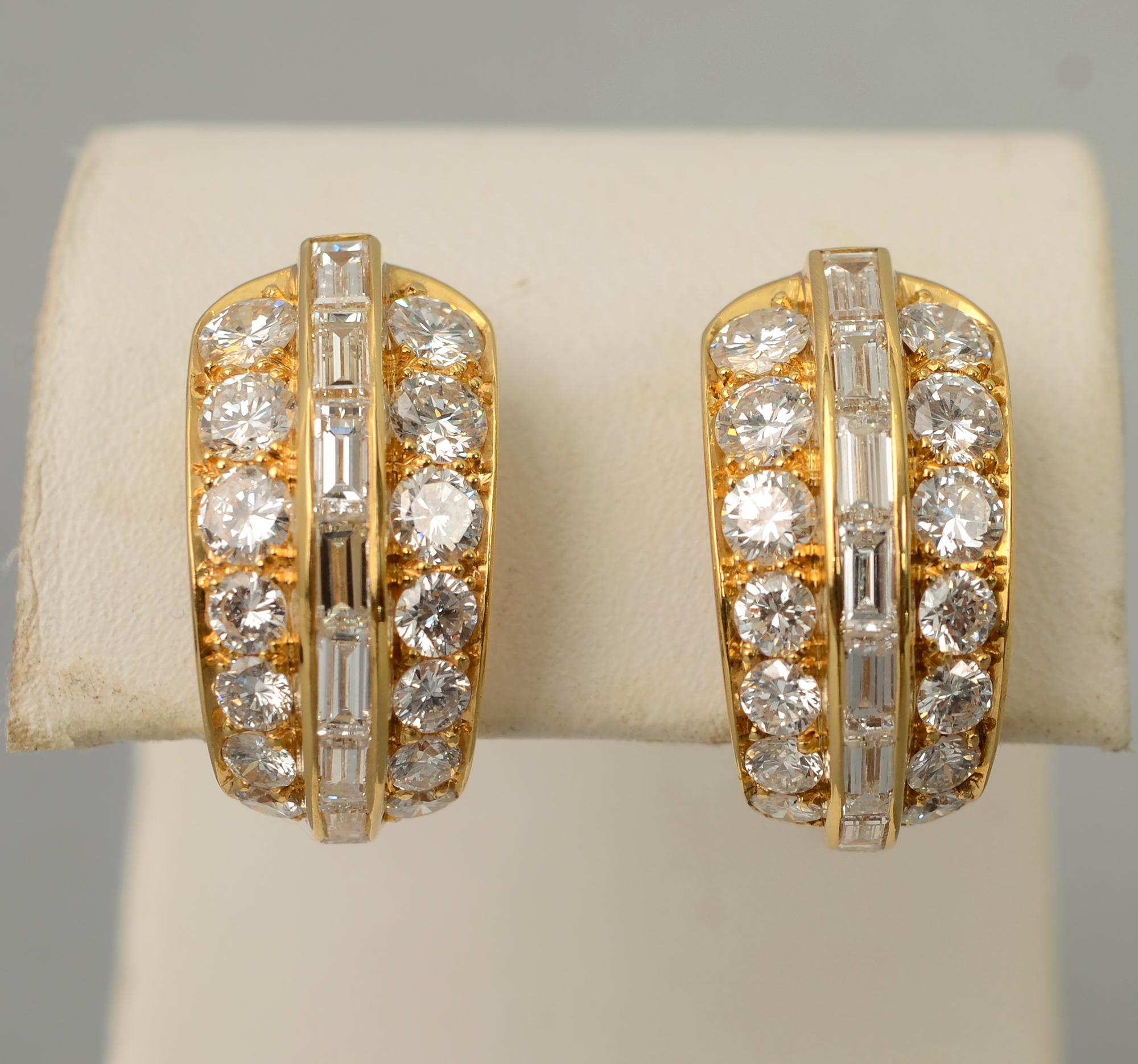 Chic and elegant diamond half hoop earrings by Bulgari. They consist of 44 diamonds; VS 1 quality with a total weight of 4.5 carats. The earrings measure 3/4 