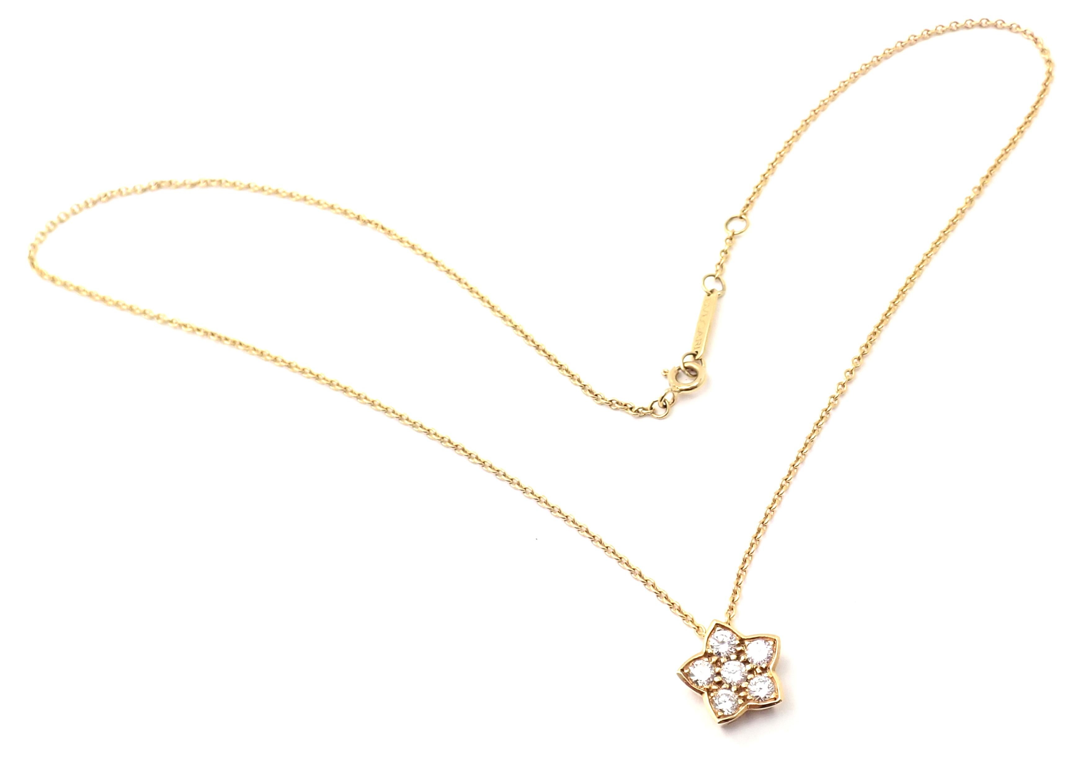 18k Yellow Gold Diamond Flower Pendant Necklace by Bulgari.  
With 6 round brilliant cut diamonds VS1 clarity G color total weight approximately .50ct
Details: Length: 16 1/4