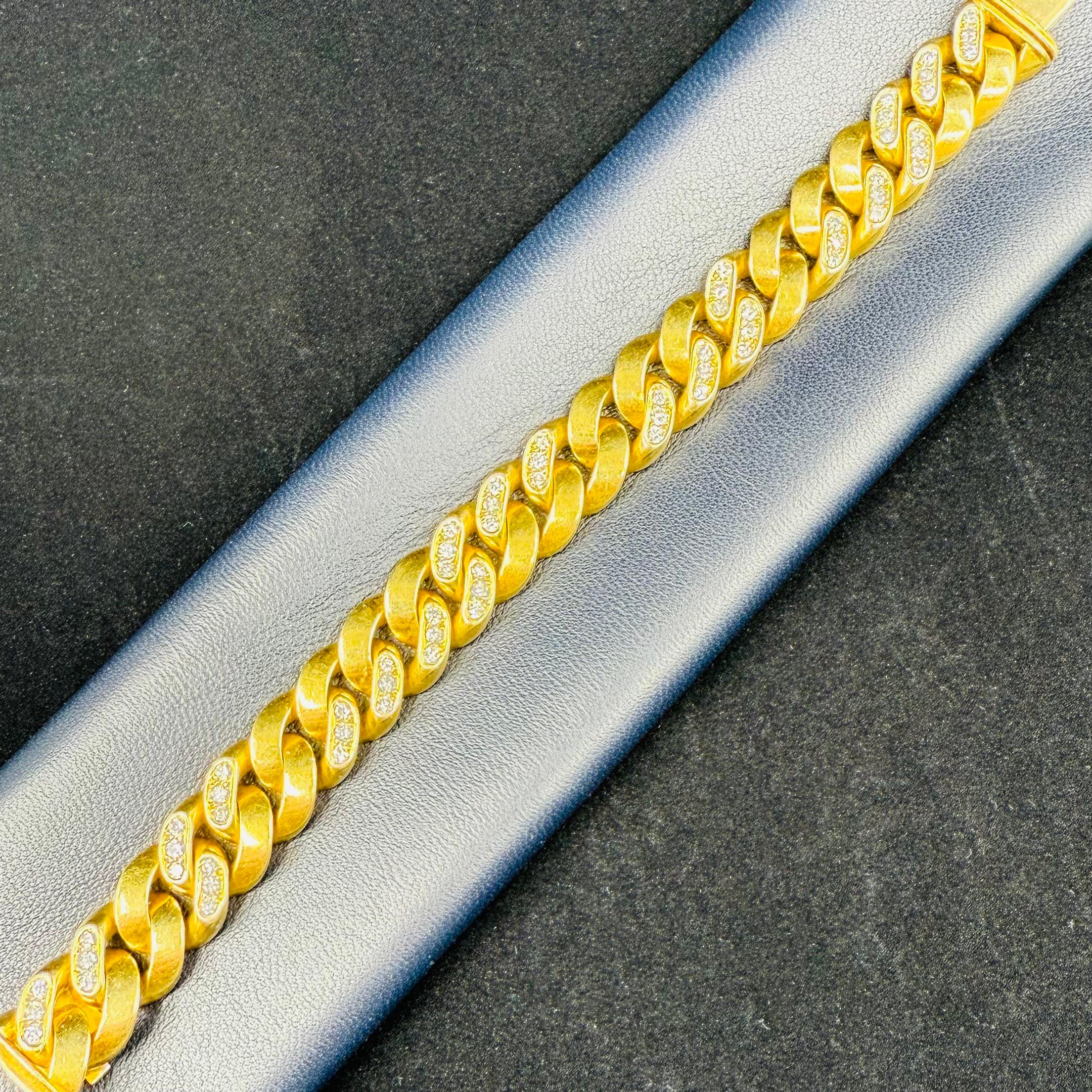 Bvlgari Signed and Numbered Wide Link Bracelet with 66 Fine White Diamonds aprox 4.50 cts
Length: 7 inches
Width: .55 Inches
Gram: 97 g of 18k 
Yellow Gold
66 Round Diamonds 4.50 cts 
Signed Hallmark BVLGARI NY #V172 
Original condition patina
