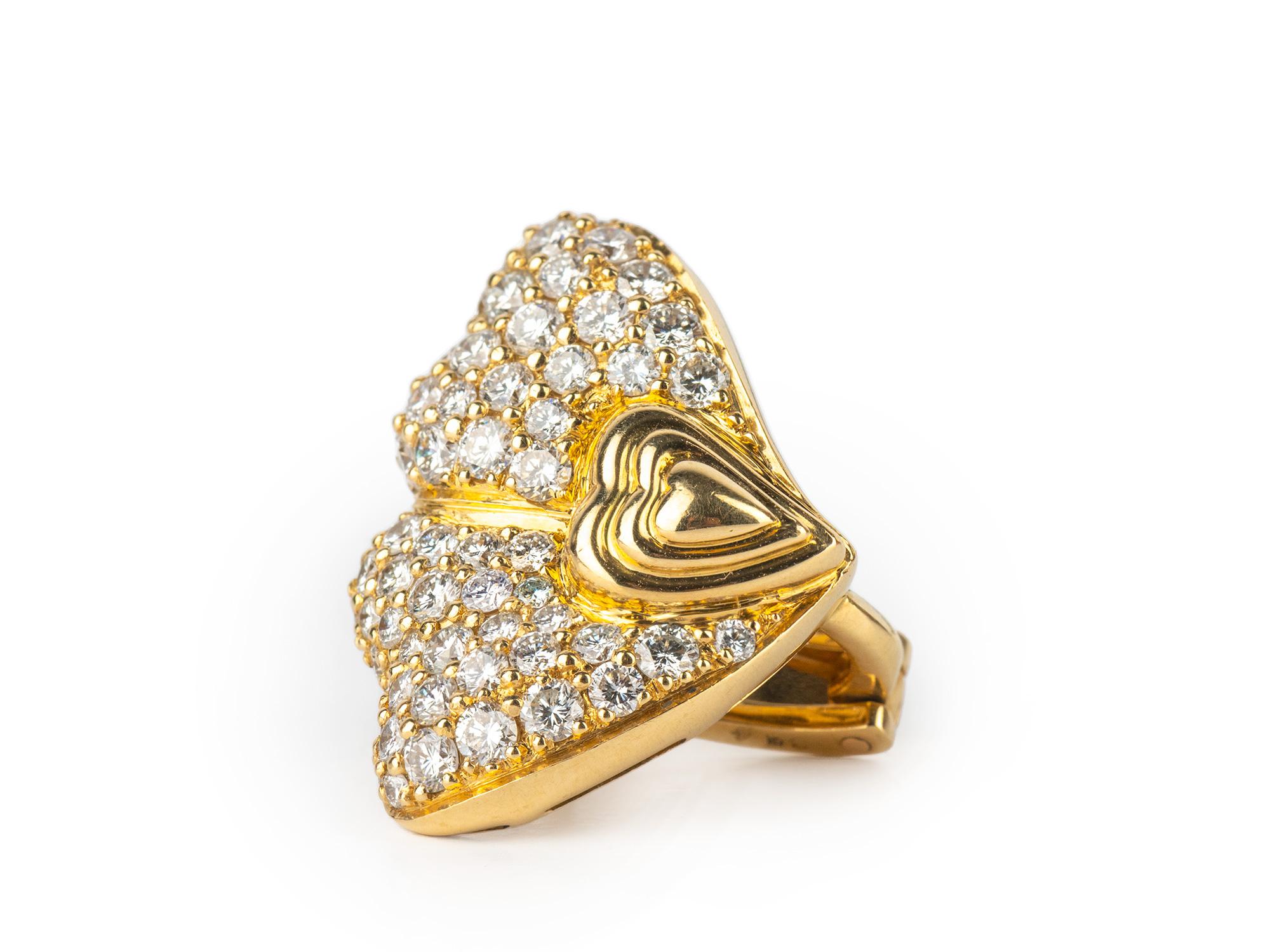 Beautiful Diamond Heart Earrings signed Bulgari, Italy mounted in 18k Yellow Gold.