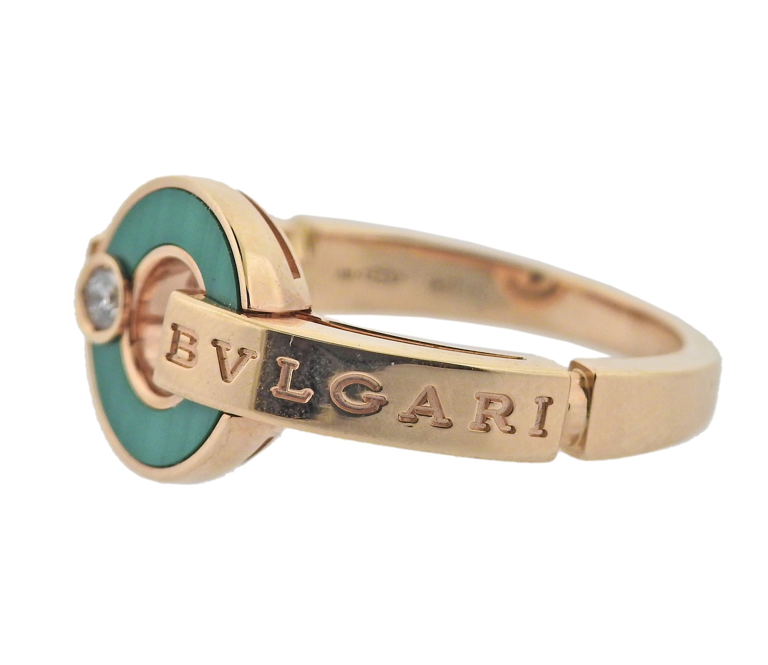 18k rose gold Bvlgari malachite and 0.08ctw G/VS diamonds ring. Retail $2640. Comes with COA and box. Ring size 6.25, top is 11mm in diameter. Mared Bvlgari, made in Italy, Italian mark, 750, Serial number. Weight 5.7 grams