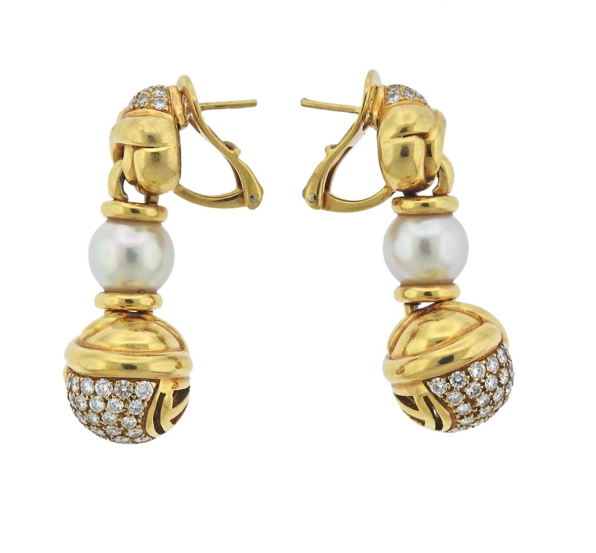 Pair of 18k golddrop earrings, crafted by Bvlgari, decorated with approx. 1.00ctw in G/VS diamonds and  8.6mm pearls.  Earrings measure 36mm x 13.5mm and weigh 23.5 grams. Marked Bvlgari, 750, made in Italy, BA17681.