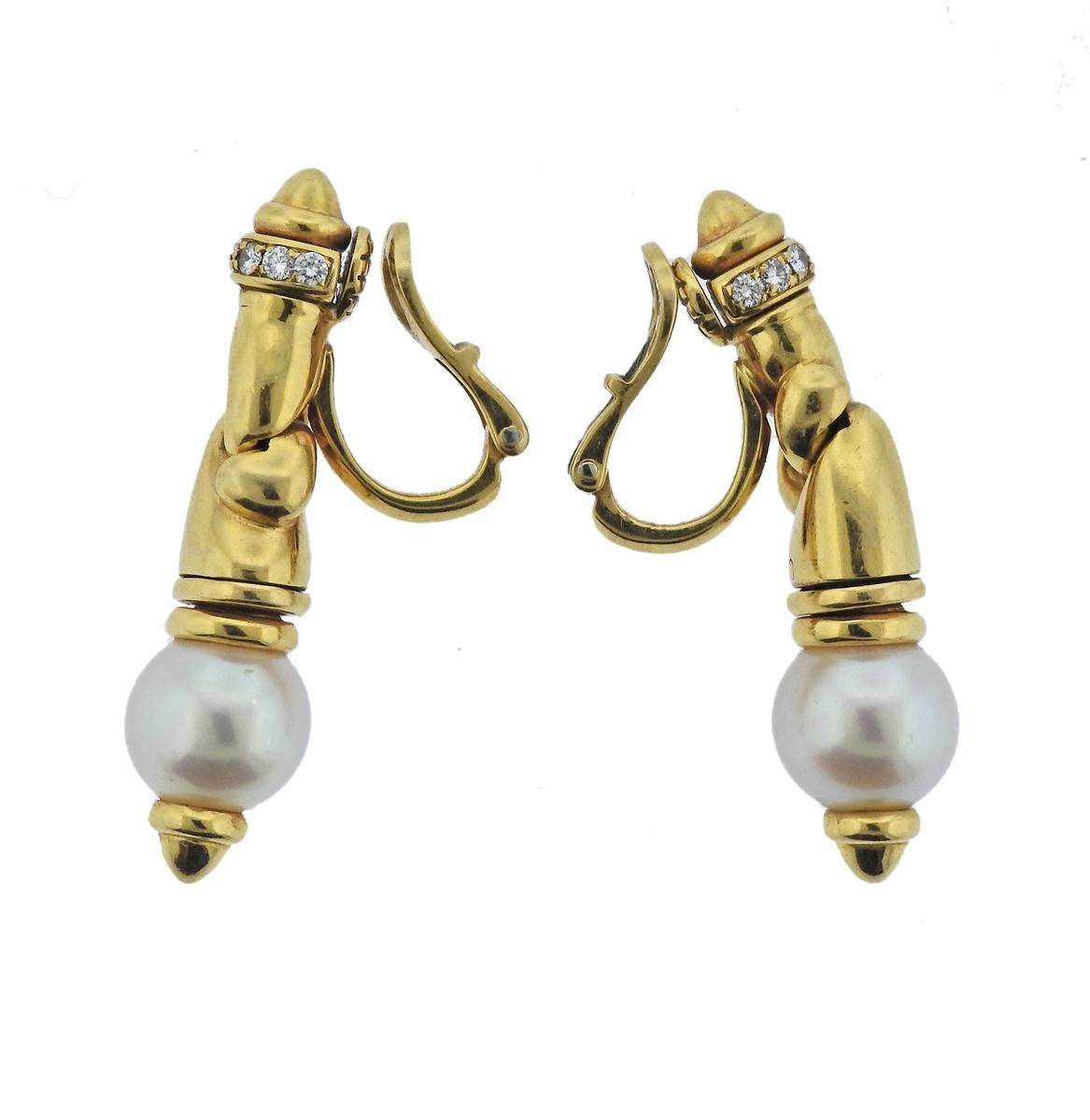 Pair of 18k golddrop earrings, crafted by Bvlgari, decorated with approx. 0.28ctw in G/VS diamonds and  9.5mm pearls. Earrings are 37mm long and weigh 22.1 grams. Marked Bvlgari, 750, 1989,  2337L, made in Italy.
