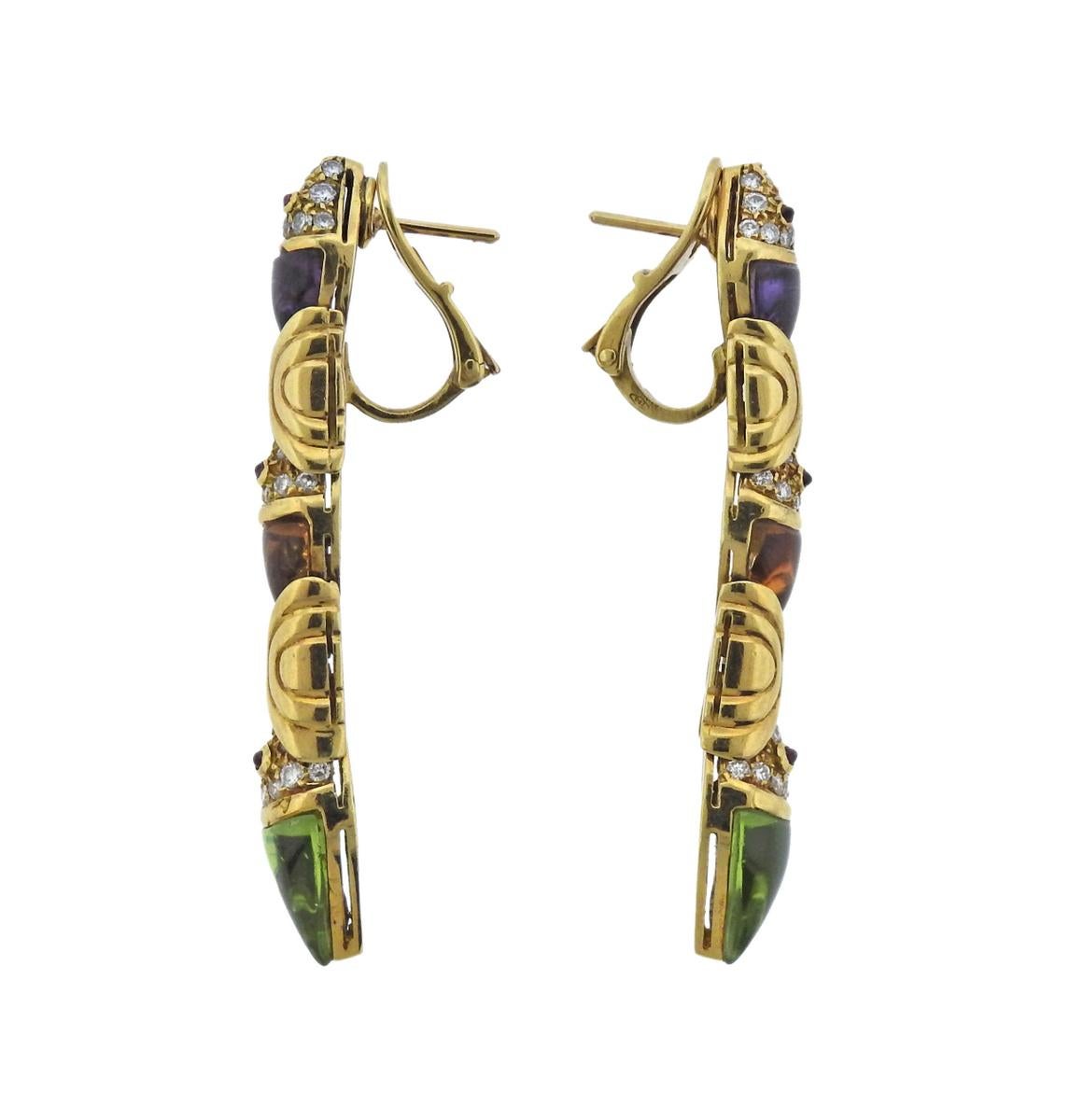 Pair of 18k yellow gold drop earrings, crafted by Bvlgari, decorated with citrine, amethyst and peridot gemstone, adorned with approx. 0.80ctw in G/VS diamonds. Earrings are 50mm x 10mm and weigh 23.2 grams. Marked Bvlgari, 750, BA9507.