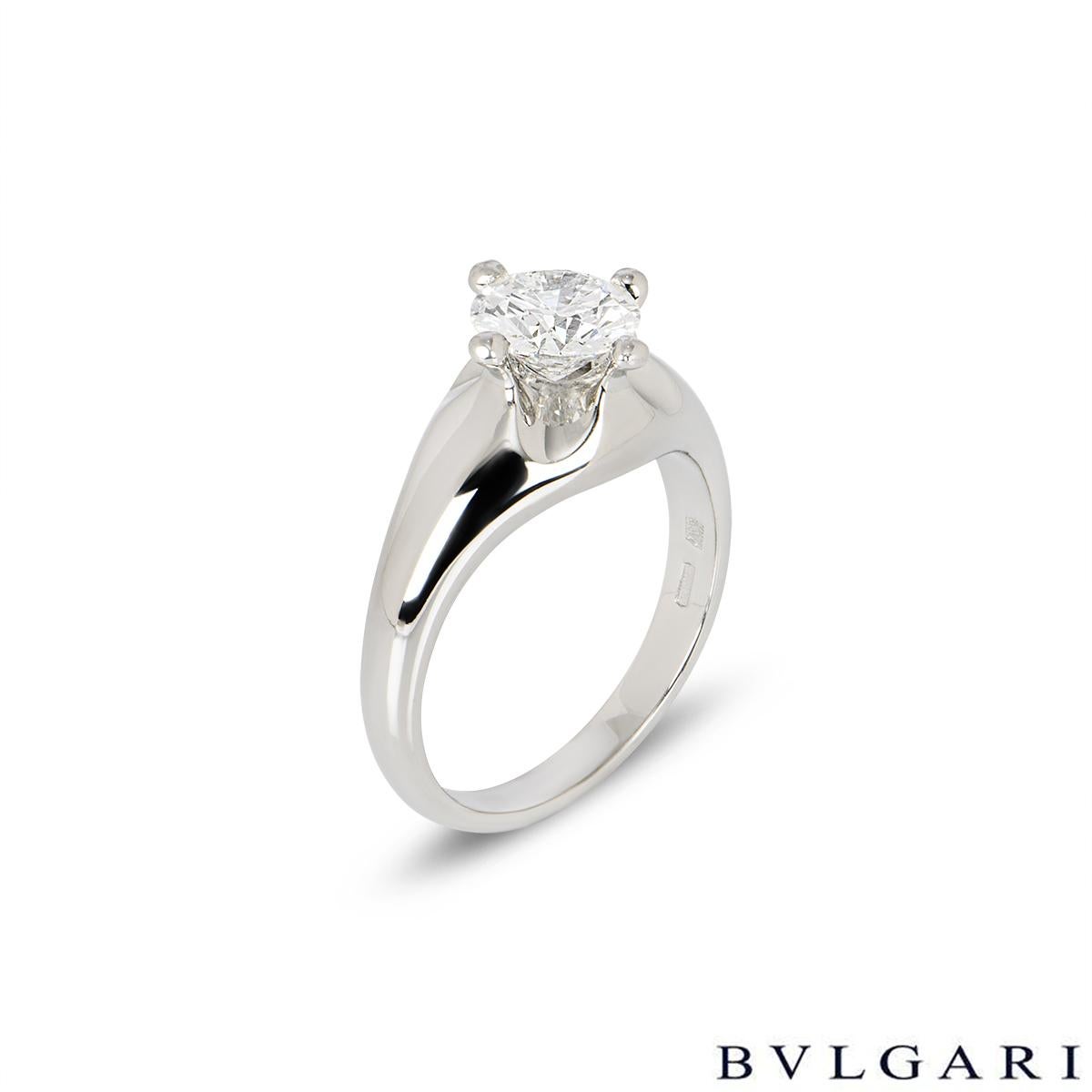 A stunning diamond single stone ring in platinum by Bvlgari. The ring is set to the centre with a 1.11ct round brilliant cut diamond in a raised four claw compass setting, F in colour and VVS1 in clarity. The tapered 8mm ring is currently a size UK