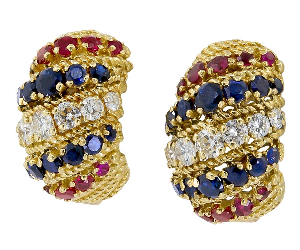 
A pair of 18k yellow gold earrings, set with brilliant-cut diamonds, sapphire, and ruby, signed Bulgari.

Circa 1950s
Dimensions approx. 2 cm
