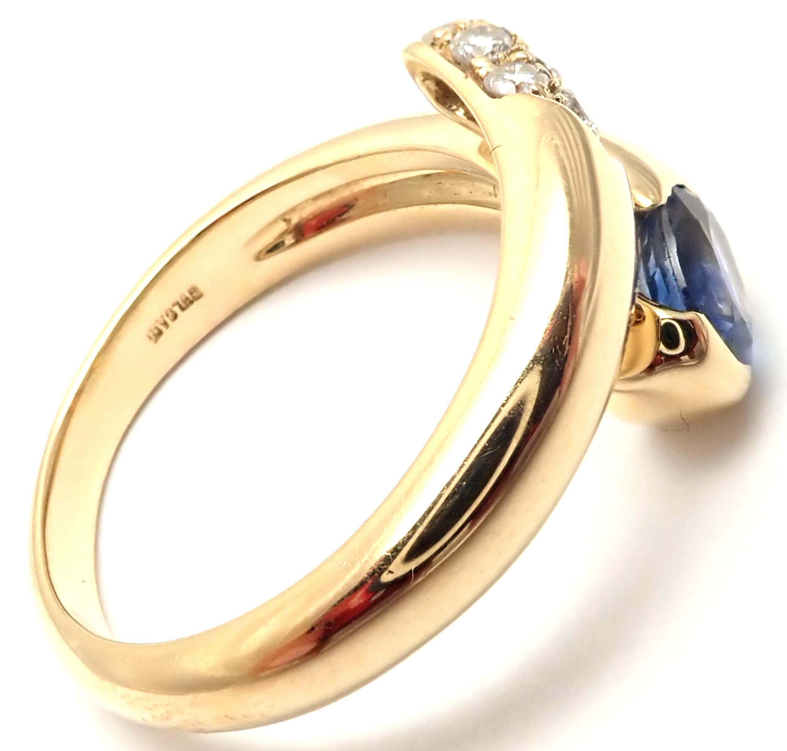 18k Yellow Gold Diamond and Sapphire Ring by Bulgari. 
With 210 round brilliant cut diamonds VS1 clarity, G color total weight approx. .20ct
1 oval cut sapphire 5mm x 5mm
Details: 
Ring Size: 6
Weight: 6.3 grams
Width: 11mm
Stamped Hallmarks: