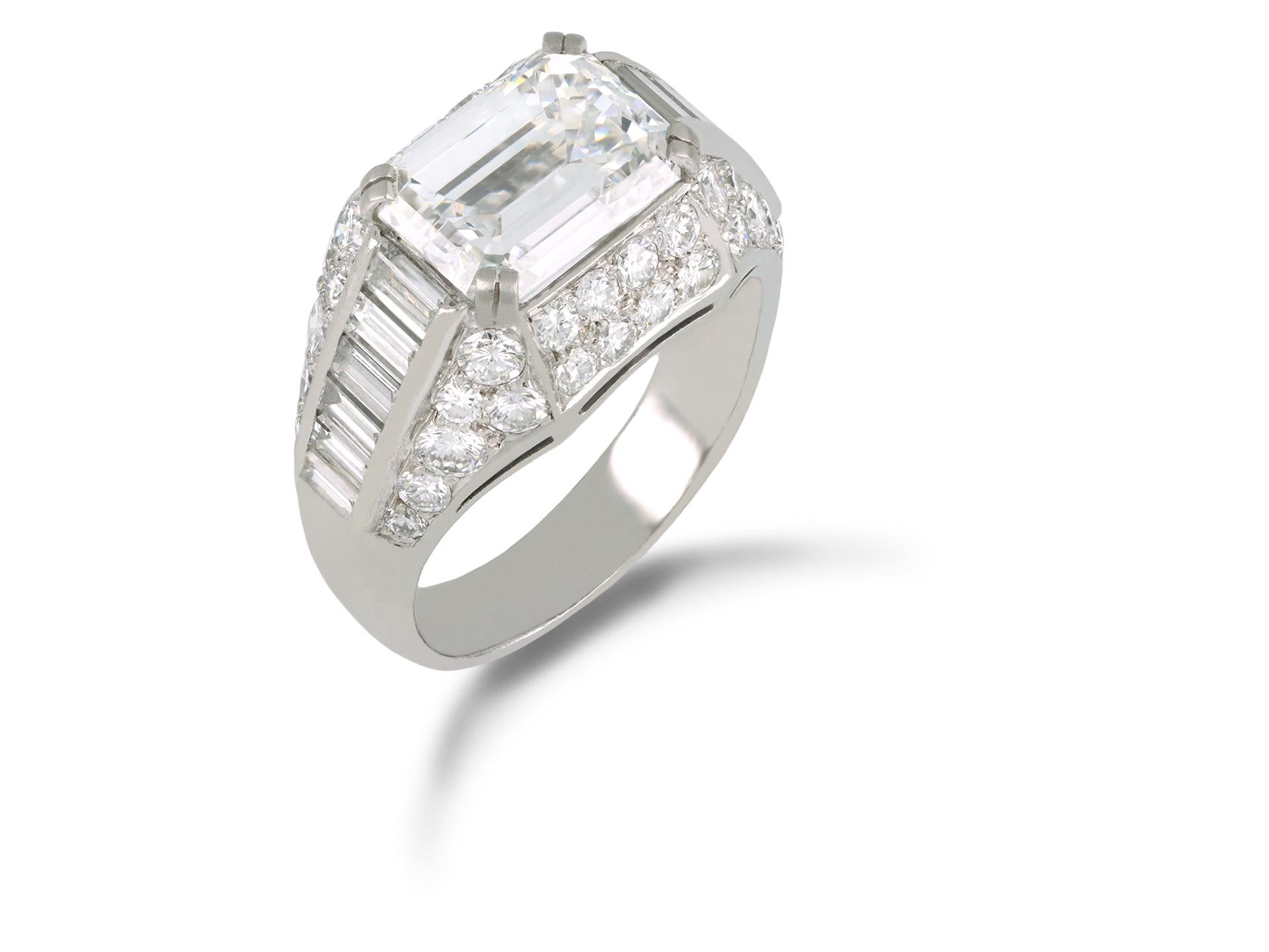 Bulgari diamond Trombino ring. Set to centre with an octagonal emerald-cut diamond, E colour, VVS2 clarity, with a weight of 3.11 carats in an open back claw setting, flanked by twelve rectangular baguette cut diamonds in open back channel settings