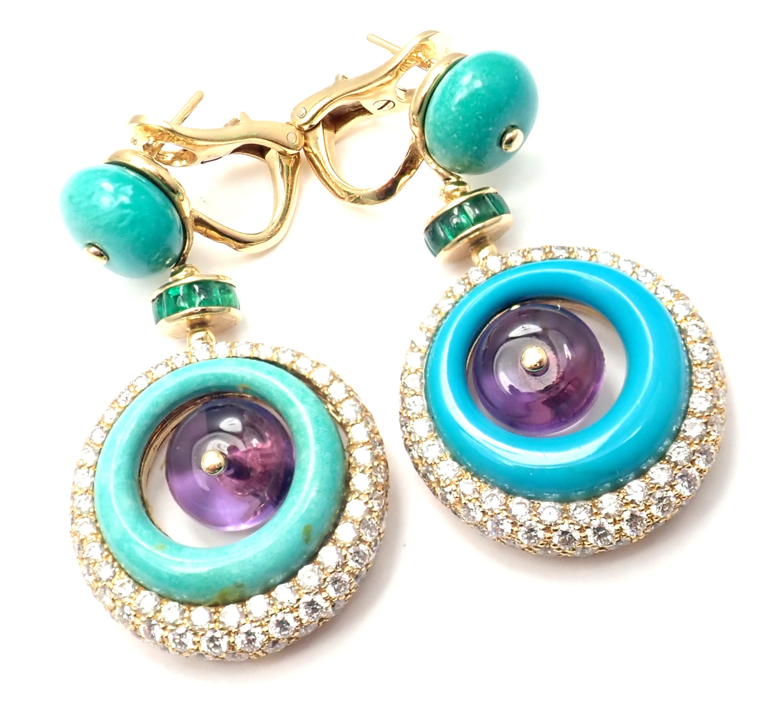 18k yellow gold diamond, turquoise, amethyst, green tourmaline drop earrings by Bulgari.
With 136 round brilliant cut diamonds VS1 clarity G color total weight approx. 3ct
Turquoise stones
2 Amethyst stones
Green tourmalines
Detail:
Measurements: 