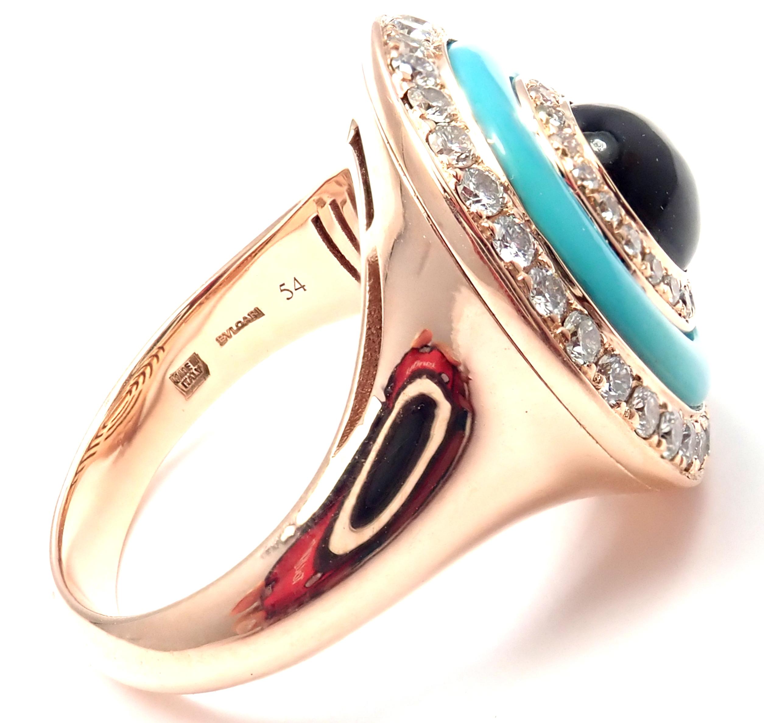 18k Rose Gold Diamond Turquoise Green Tourmaline Ring by Bulgari.  
With 52 round brilliant cut diamonds VS1 clarity E color total weight approx. 1ct
Turquoise 
1 Round Green Tourmaline
Details: European 54, US 6 3/4
Width: 20mm
Weight: 13.3