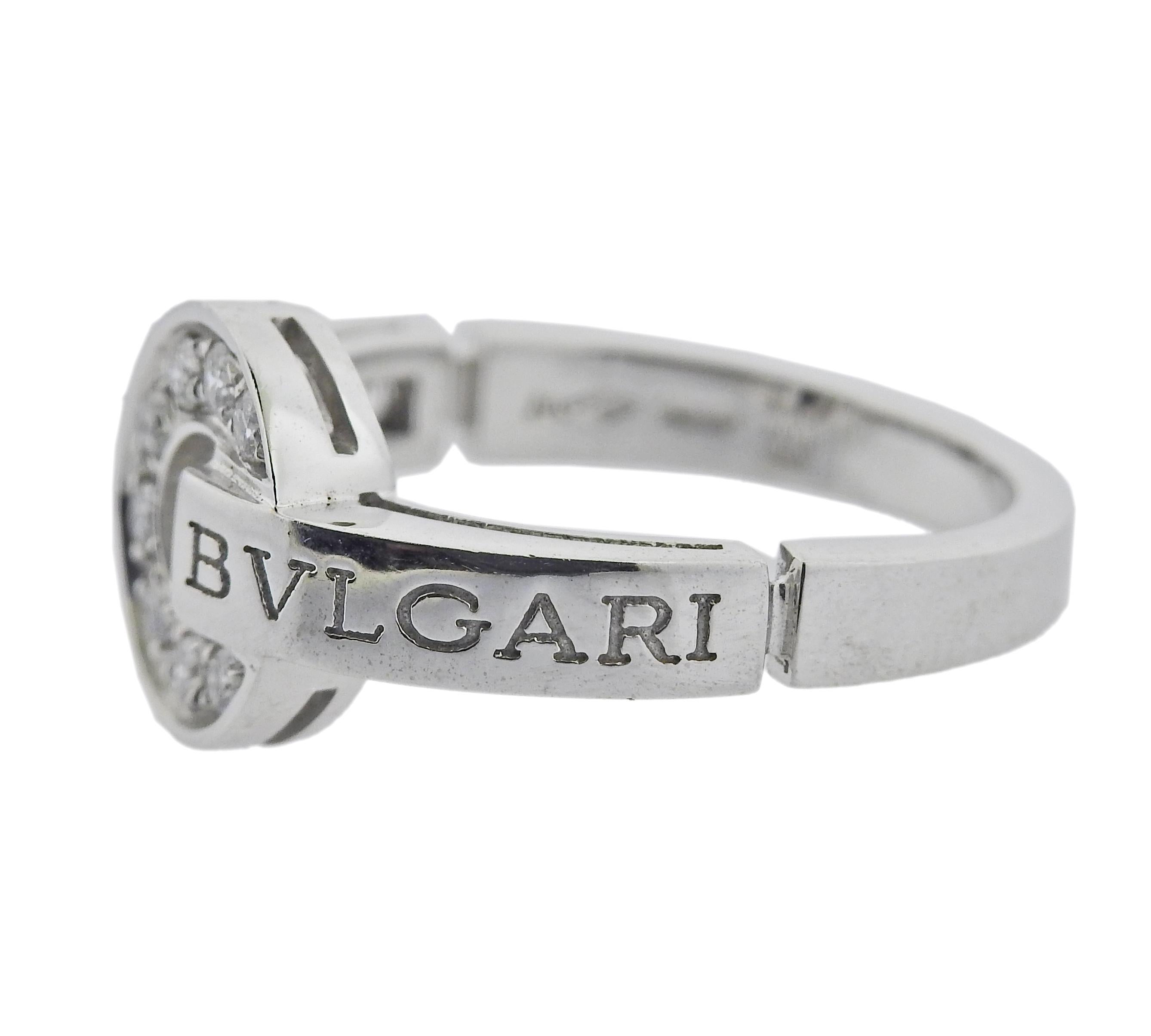 18k white gold Bvlgari ring with 0.28ctw G/VS diamonds. Retail $4600. Comes with COA and box. Ring size 7, top is 11mm in diameter. Marked Bvlgari, made in Italy, Italian mark, 750, Serial number. Weight 6.4 grams