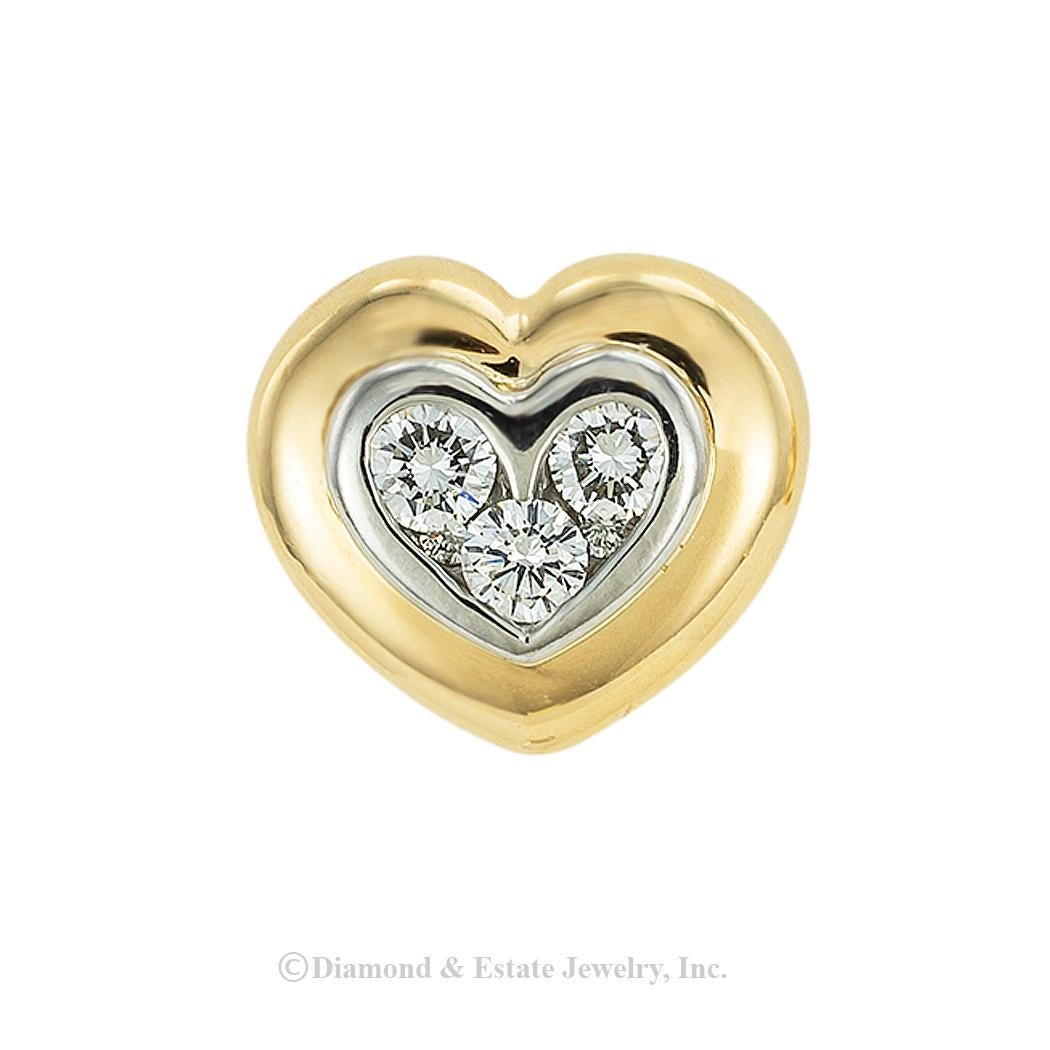 Bulgari petite diamond yellow gold and platinum heart-shaped clip-on earrings circa 1980. *

ABOUT THIS ITEM:  #E-DJ725d. Scroll down for detailed specifications.  These estate Bulgari earrings have been crafted with exacting attention to detail and