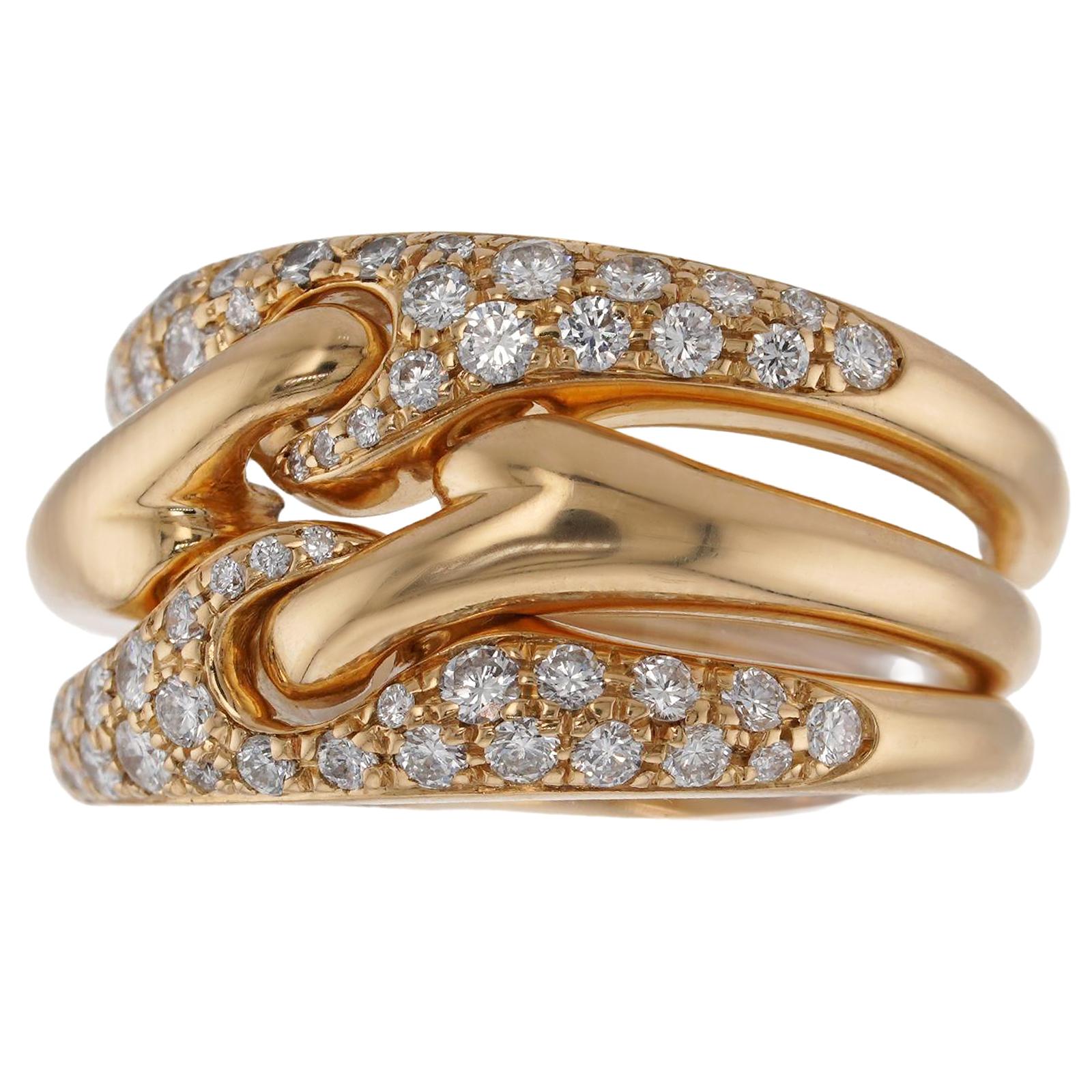 This fabulous Bvlgari ring features a 3 wavy stackable bands crafted in 18k yellow gold and set with brilliant-cut F-G VVS1-VVS2 diamonds. Made in Italy circa 1980s. Measurements: 0.47