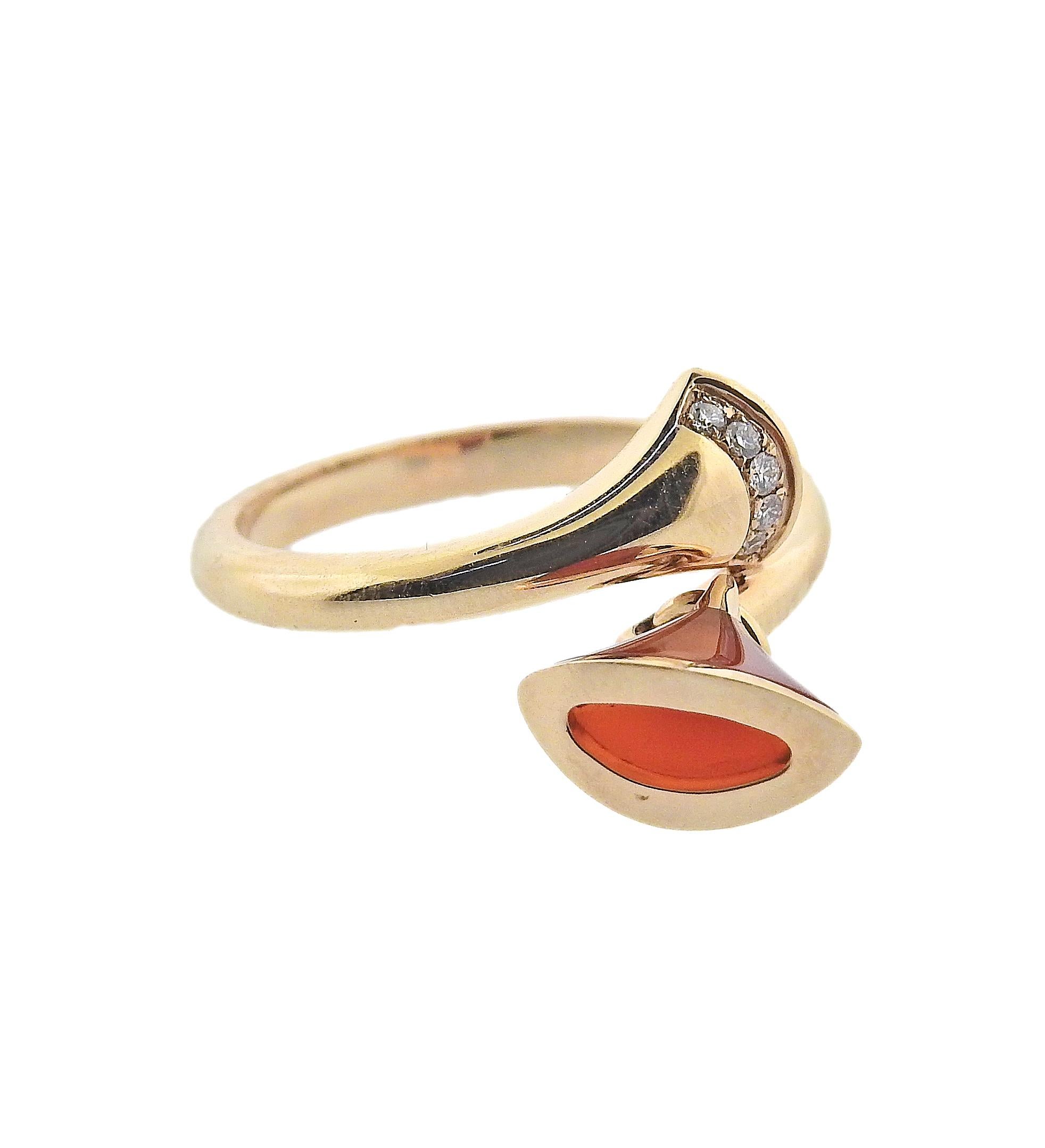18k rose gold Diva's Dream charm ring by Bvlgari, with carnelian and 0.04ctw G/VS diamonds. Ring size 6, top of the ring with charm measures 20mm. Marked: Bvlgari, Italian Mark, 750, Serial Number. Weight is 4.7 grams.  Comes with COA and box.
