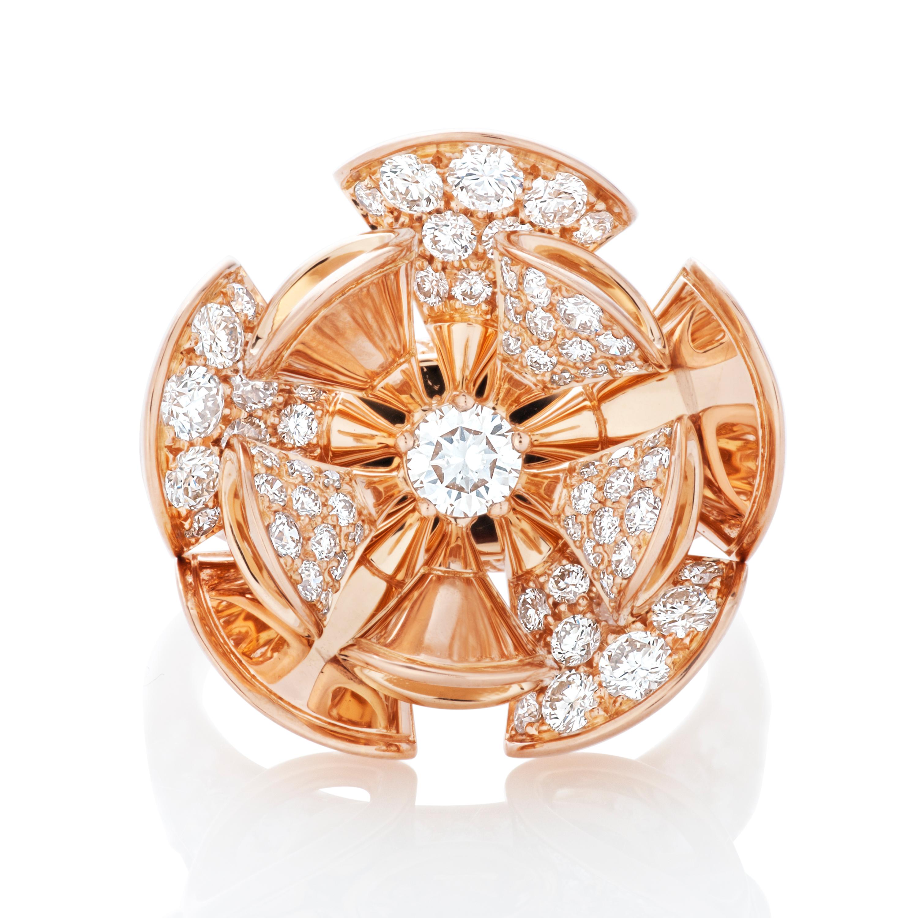 Bulgari Diva's Dream articulating fan ring in 18k rose gold.

This ring features 10 fan motifs set in a flower pattern and contains 117 round brilliant cut diamonds totaling approximately 3.15 carats with E-F color and VS clarity. 

The top of the