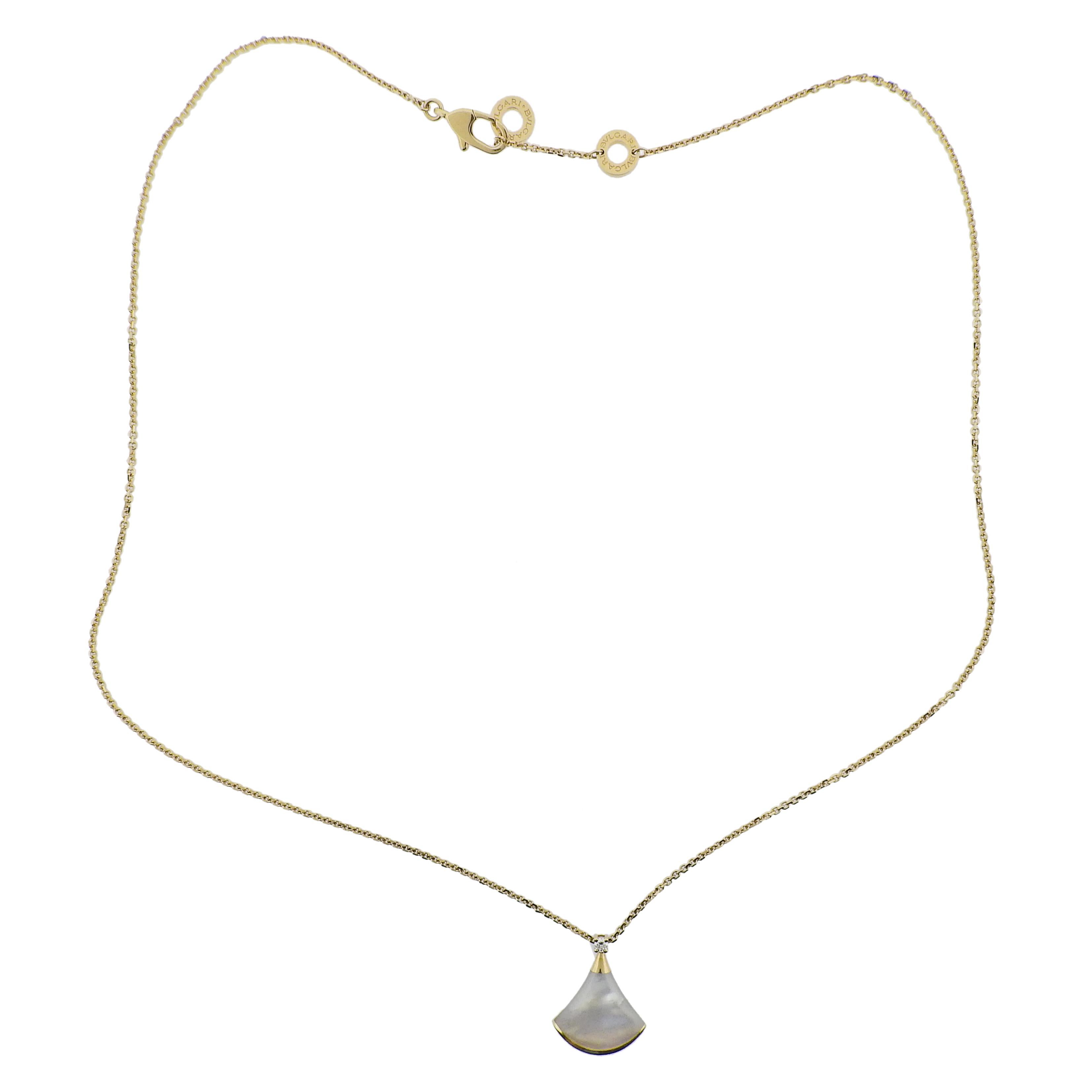 18k yellow gold Bvlgari Diva's Dream pendant necklace, with mother of pearl and 0.02ct G/VS diamond. Retail $2130. Comes with COA and box. Necklace is 17.25