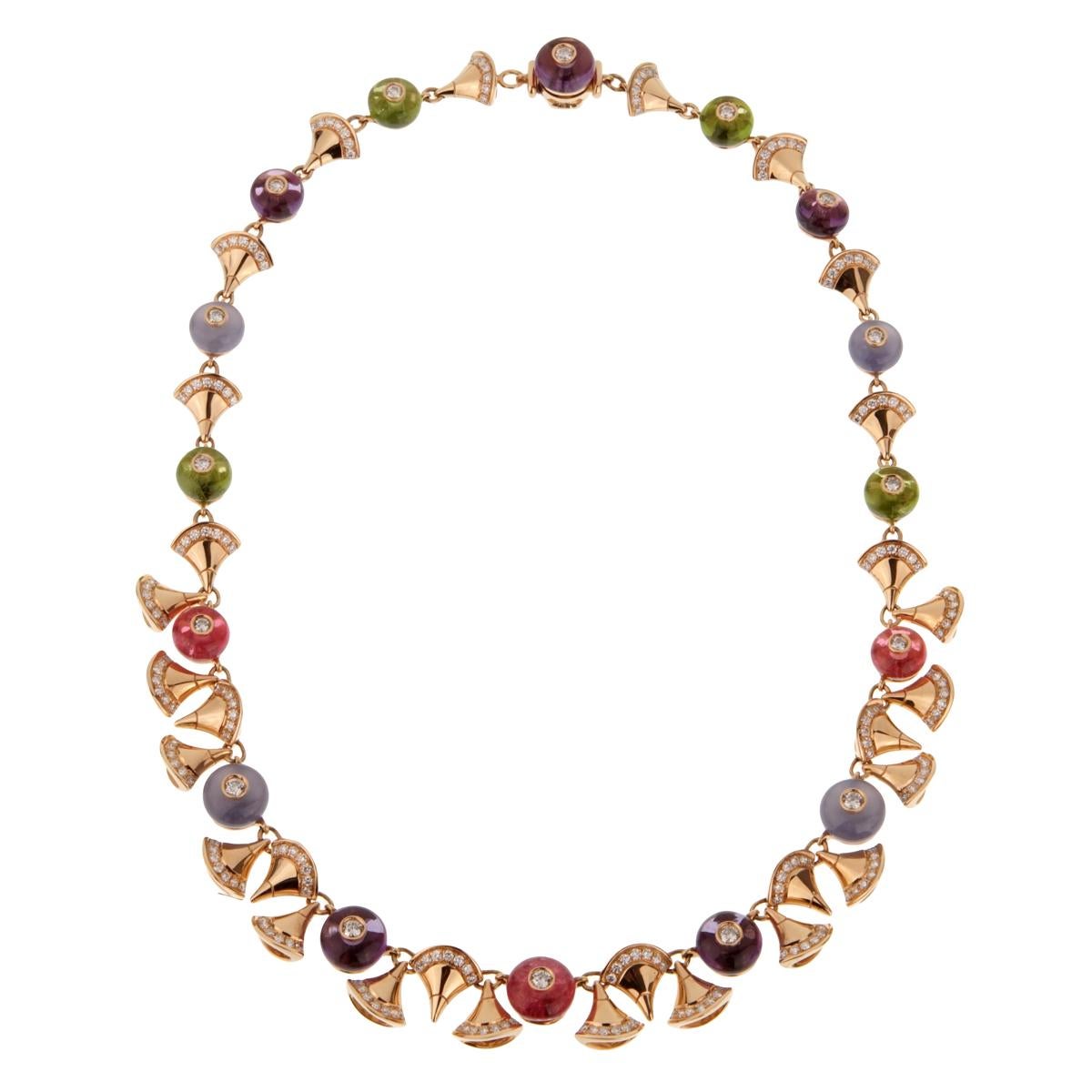A magnificent Bulgari Divas Dream necklace adorned with 13.7ct Amethyst, Peridot totaling 11.45 carats, Rubellite totaling 8.90 carats, and round chalcedony totaling 10.80 carats. 
The diamonds total 3.45ct of the finest Bulgari round brilliant cut