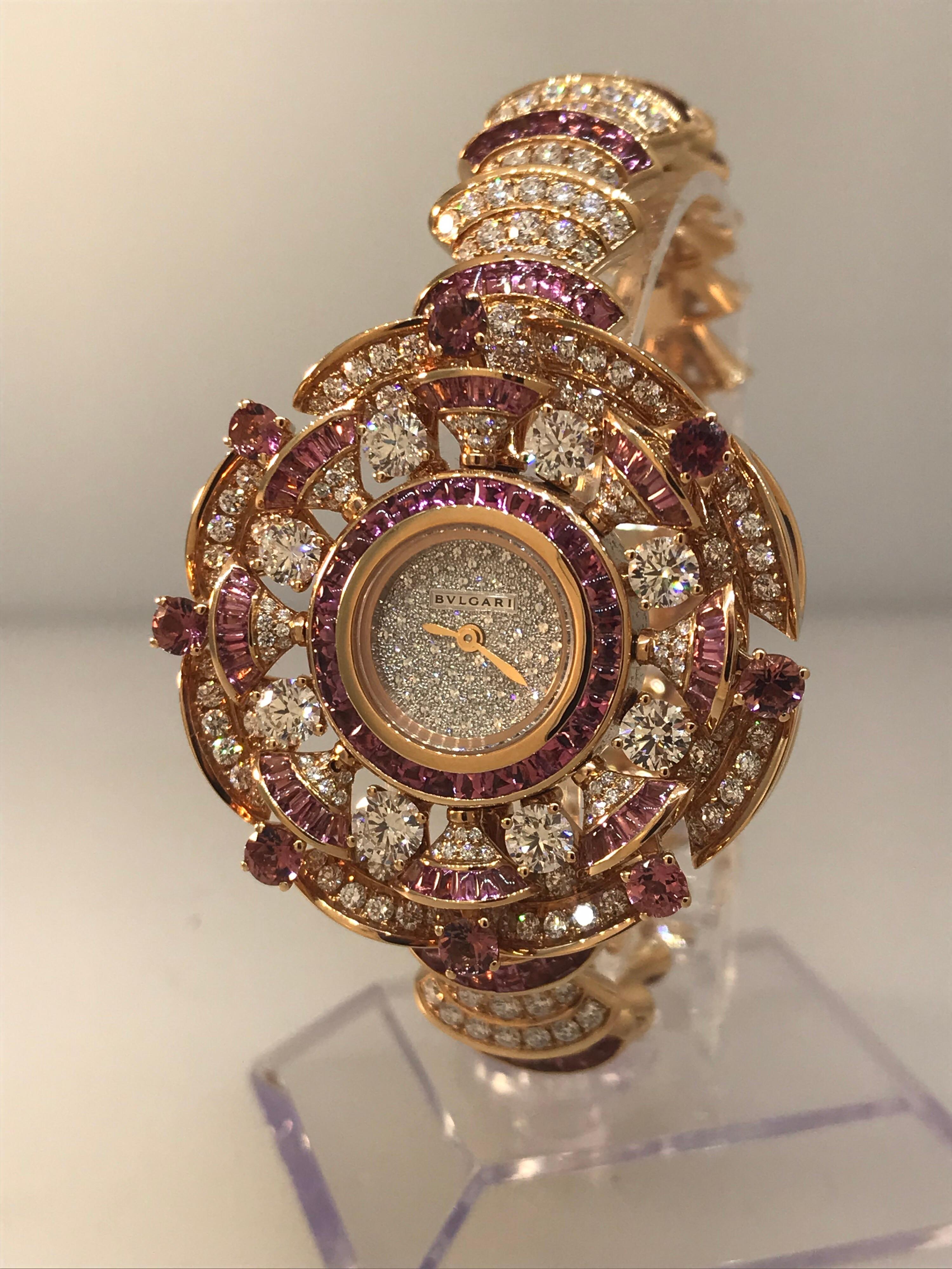 Bulgari Diva's Dream Ladies Watch

Model Number: 102562

100% Authentic

Brand New

Comes with original Bulgari box and papers

18 Karat Rose Gold Case & Bracelet

Case and bracelet set with diamonds and rubellites

Pave diamond dial set with 116