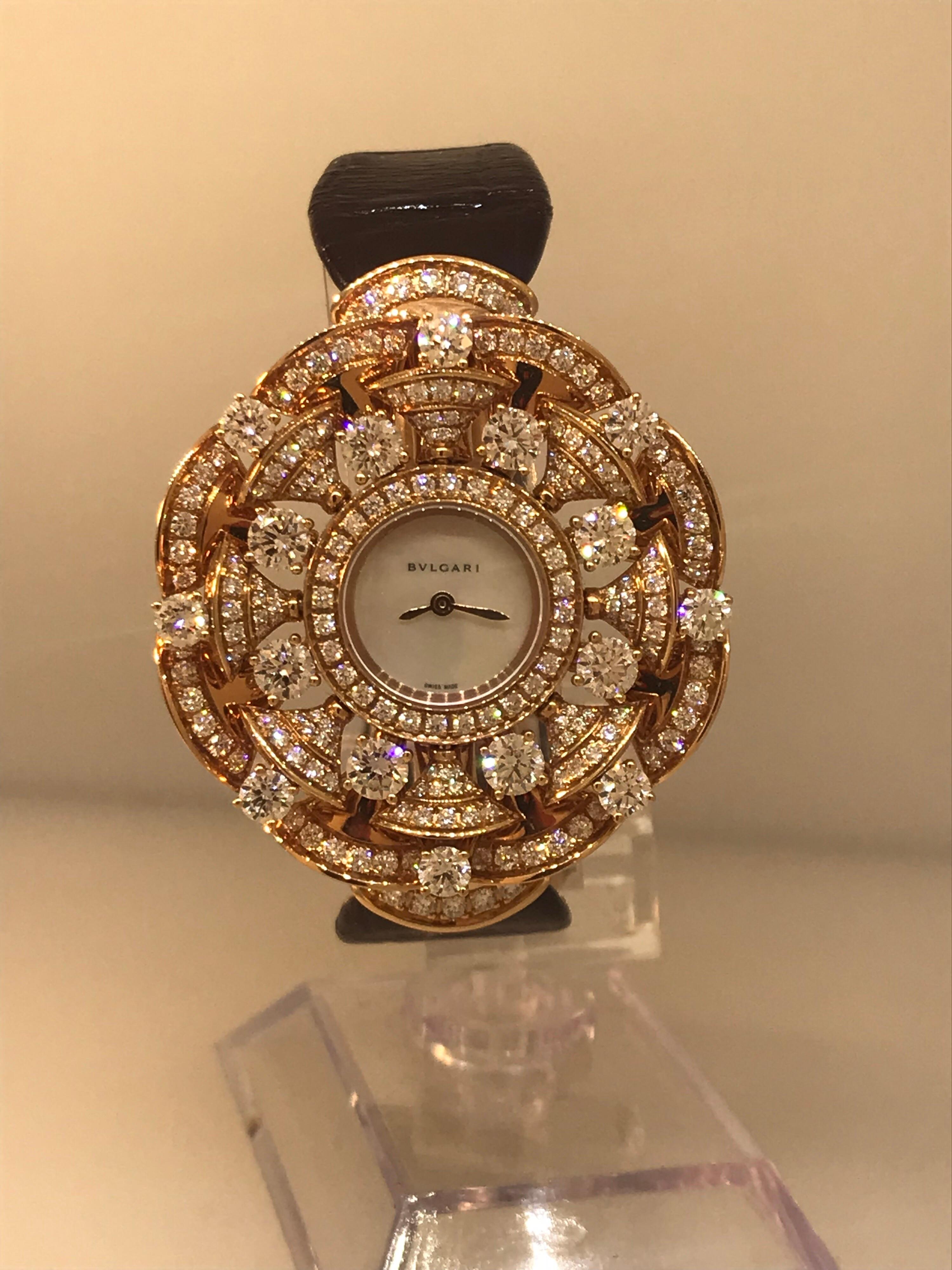 Bulgari Diva's Dream Ladies Watch

Model Number: 102546

100% Authentic

Brand New

Comes with original Bulgari box and papers

18 Karat Rose Gold Case & Buckle

Diamond Case

White Mother of Pearl Dial  

Case Diameter: 39mm

Retails for $62,000